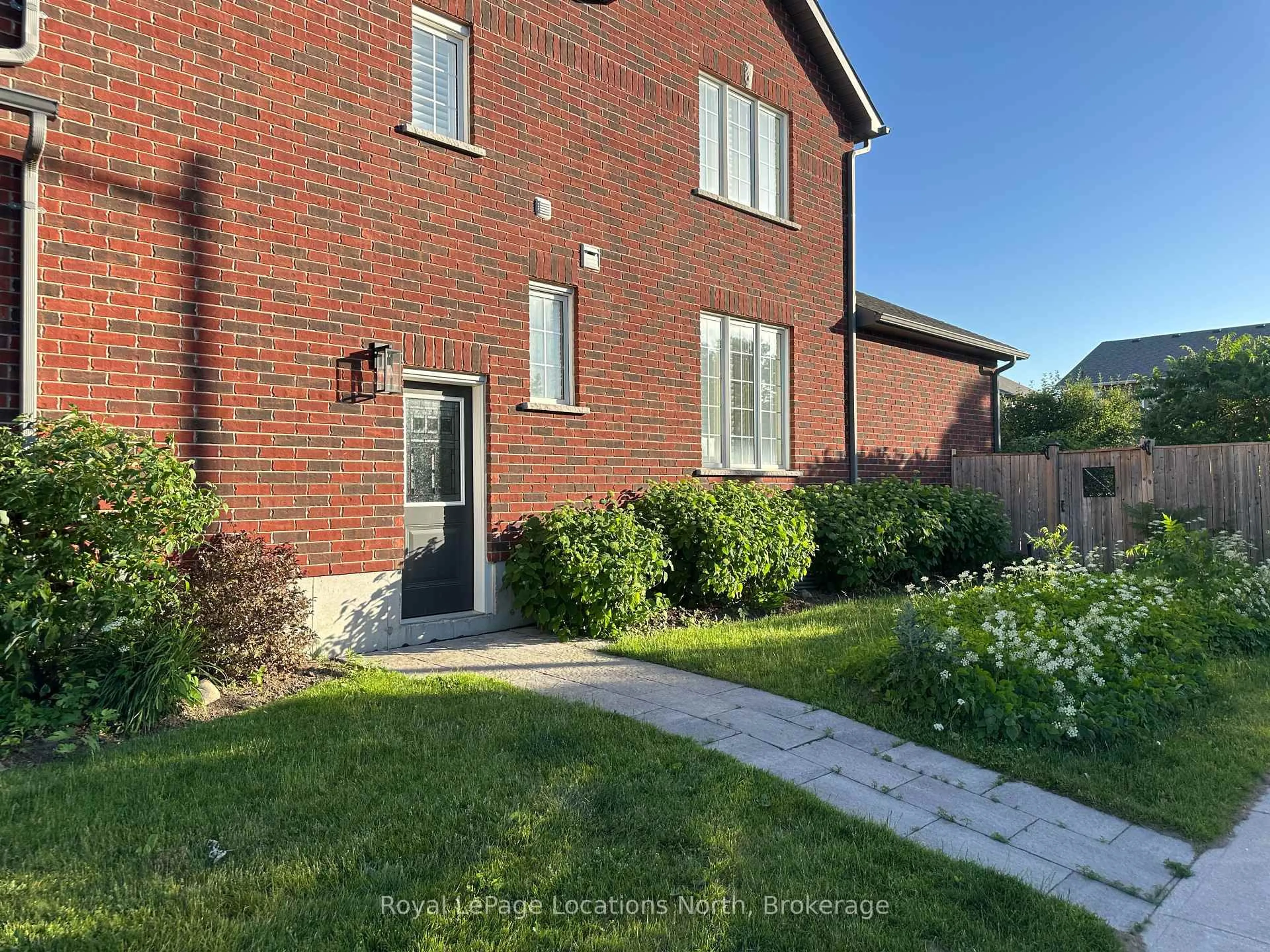 Home with brick exterior material, street for 103 Garbutt Cres, Collingwood Ontario L9Y 0H5