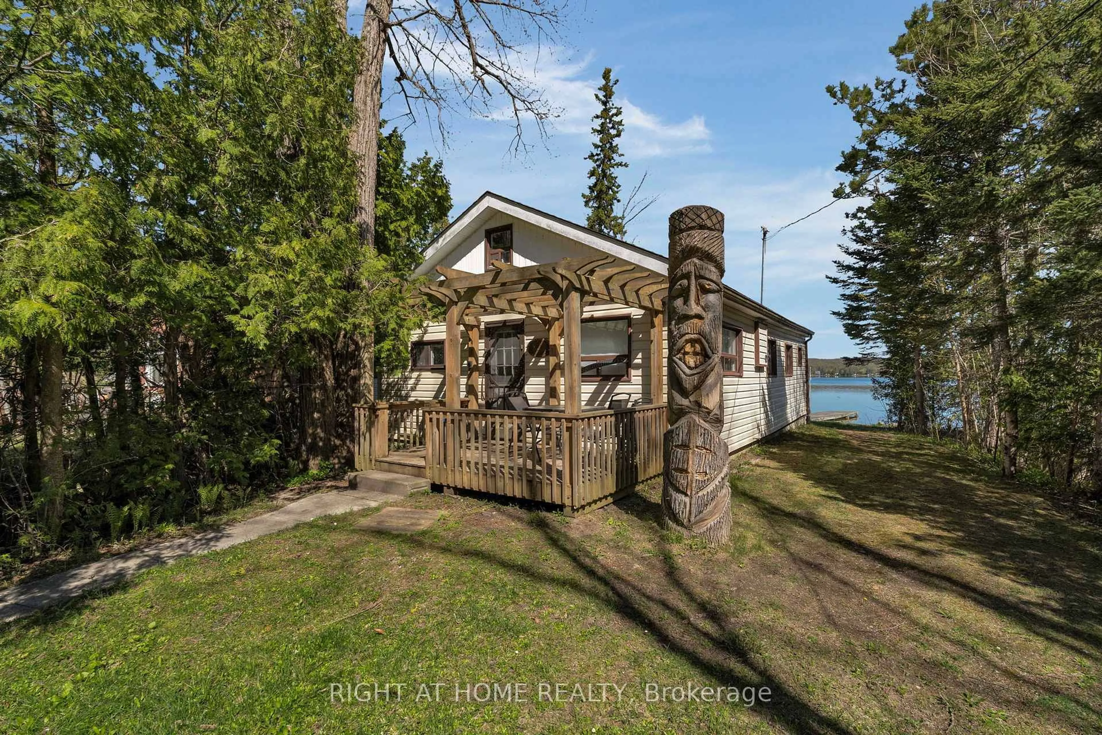 A pic from outside/outdoor area/front of a property/back of a property/a pic from drone, water/lake/river/ocean view for 2200 South Orr Lake Rd, Springwater Ontario L0L 1P0