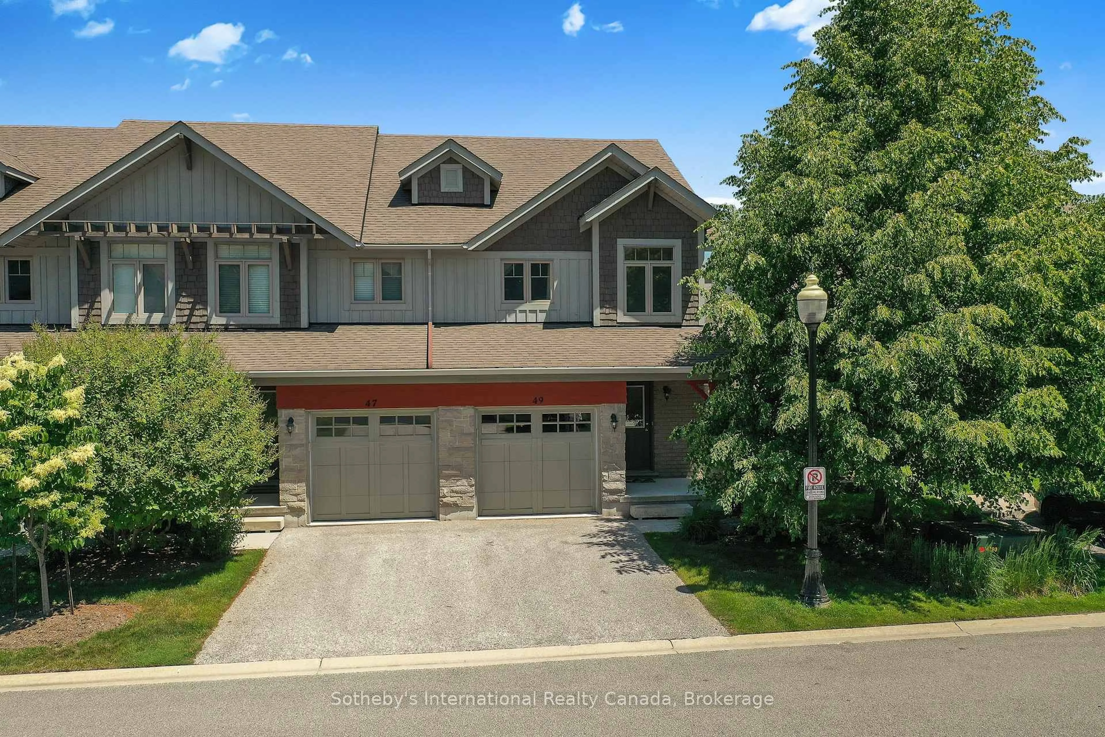 A pic from outside/outdoor area/front of a property/back of a property/a pic from drone, street for 49 Silver Glen Blvd, Collingwood Ontario L9Y 0G9