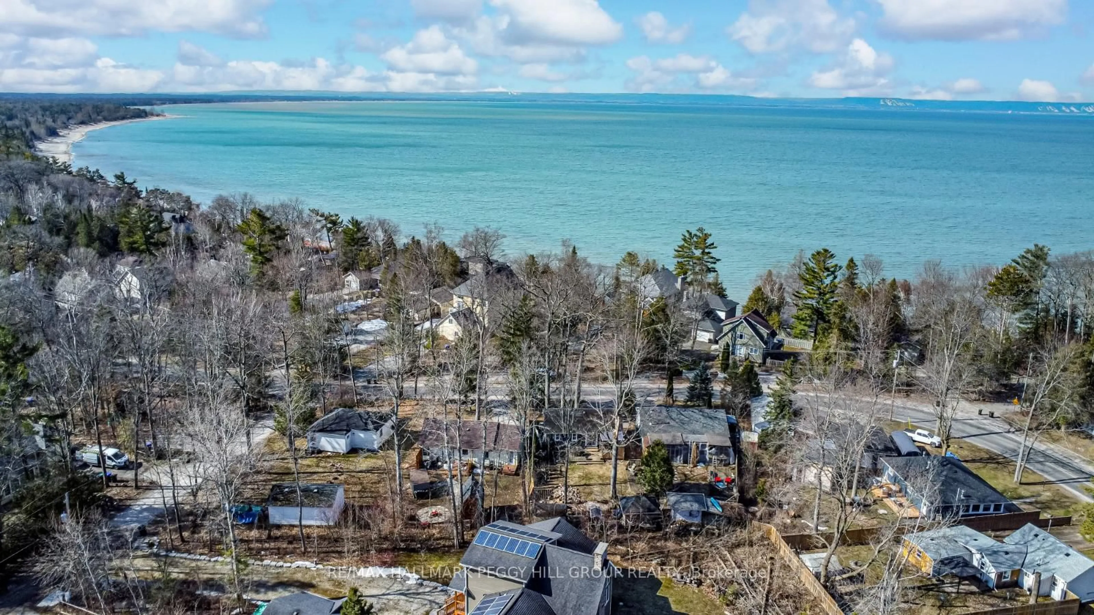 A pic from outside/outdoor area/front of a property/back of a property/a pic from drone, water/lake/river/ocean view for 1939 Tiny Beaches Rd, Tiny Ontario L0L 1P1