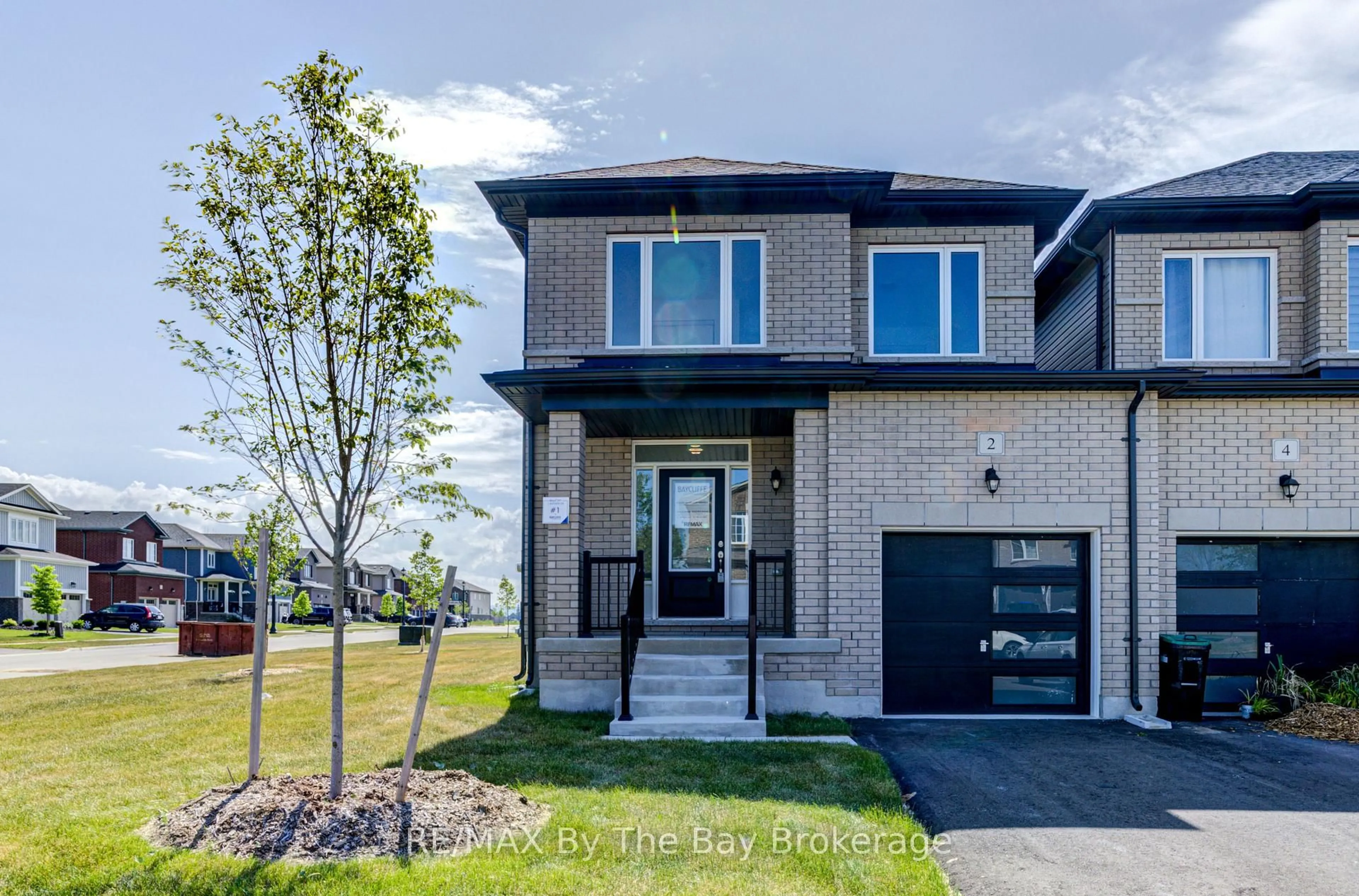 Home with brick exterior material, street for 2 Autumn Dr, Wasaga Beach Ontario L9Z 0K7