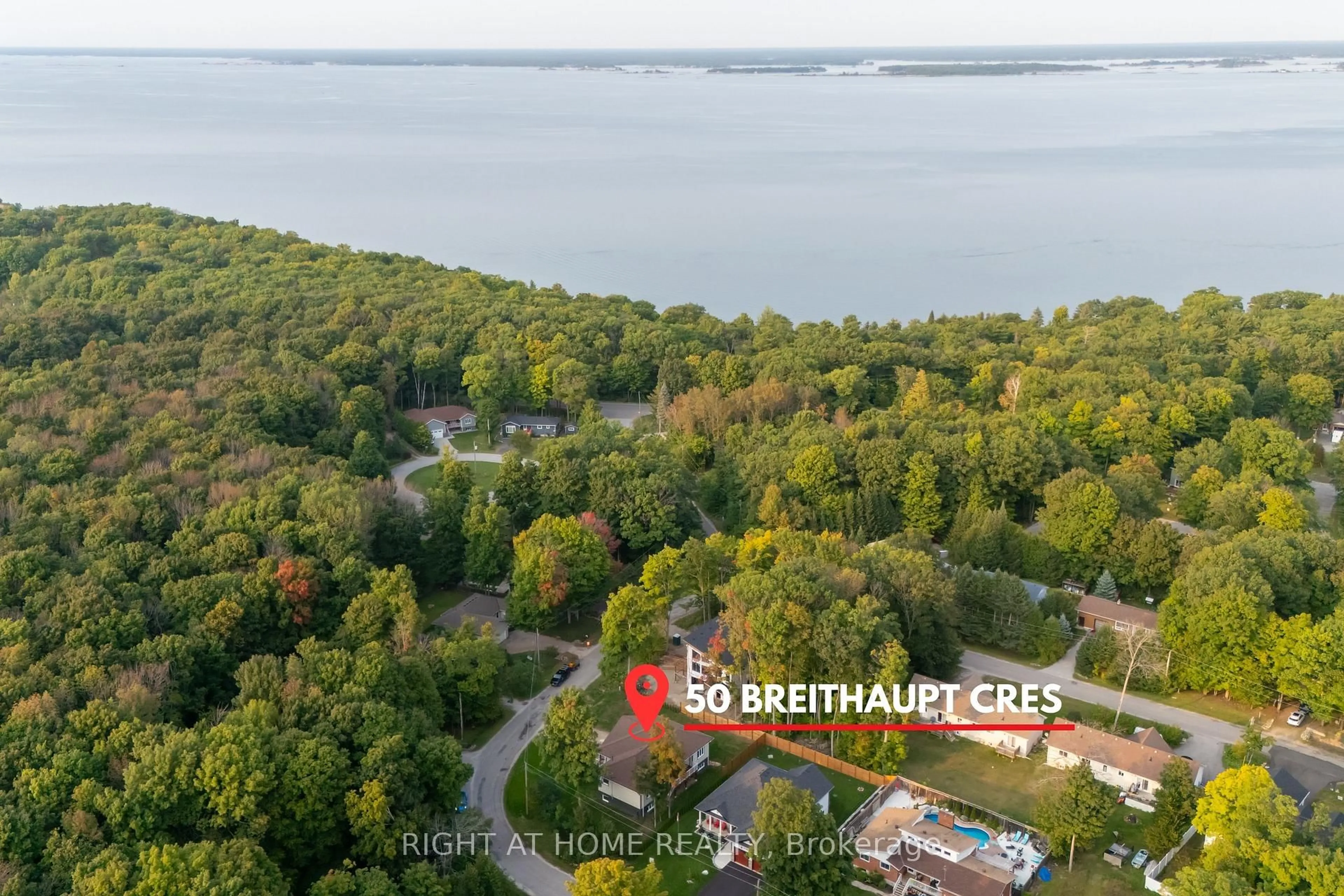 A pic from outside/outdoor area/front of a property/back of a property/a pic from drone, water/lake/river/ocean view for 50 Breithaupt Cres, Tiny Ontario L9M 0B2
