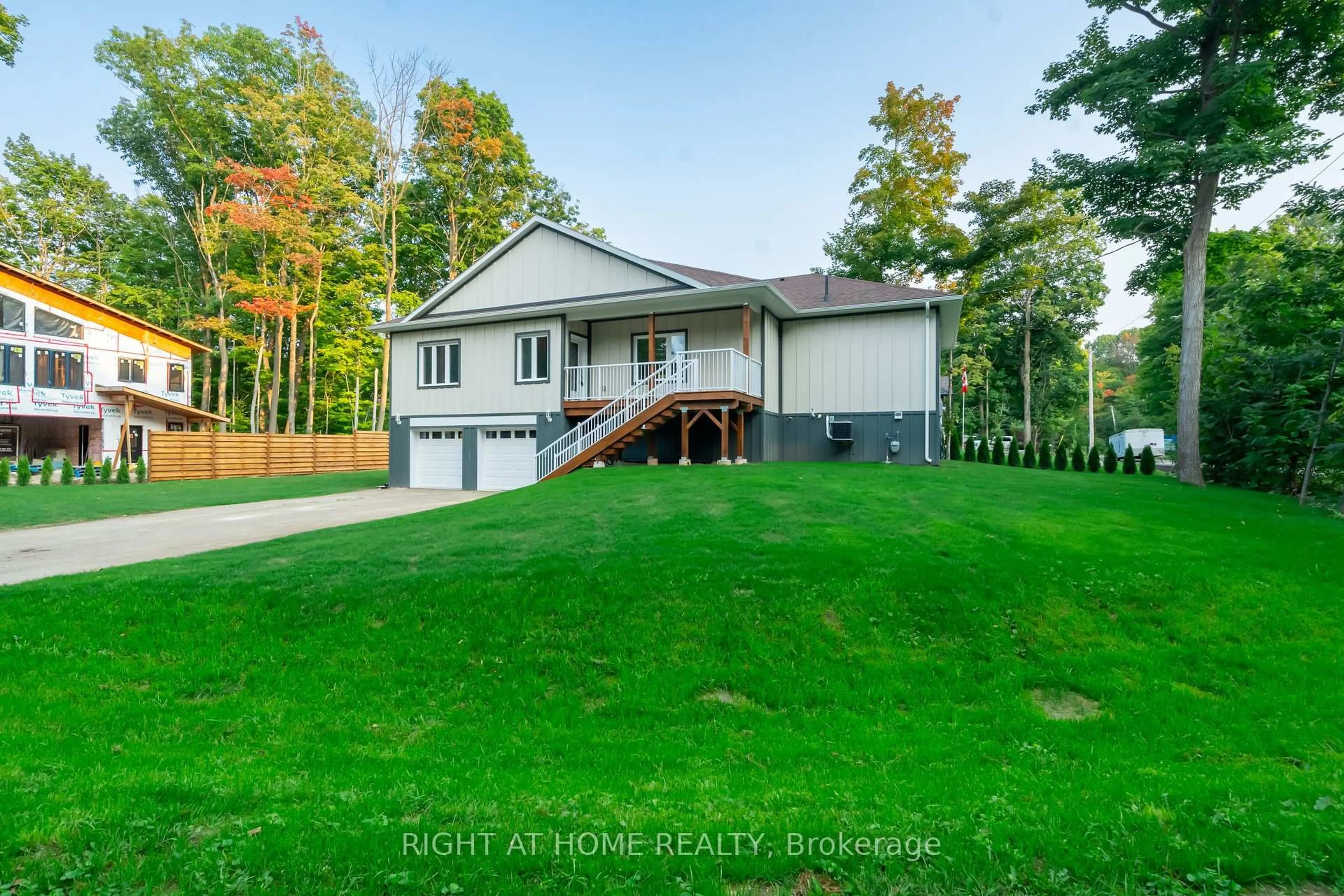 A pic from outside/outdoor area/front of a property/back of a property/a pic from drone, unknown for 50 Breithaupt Cres, Tiny Ontario L9M 0B2