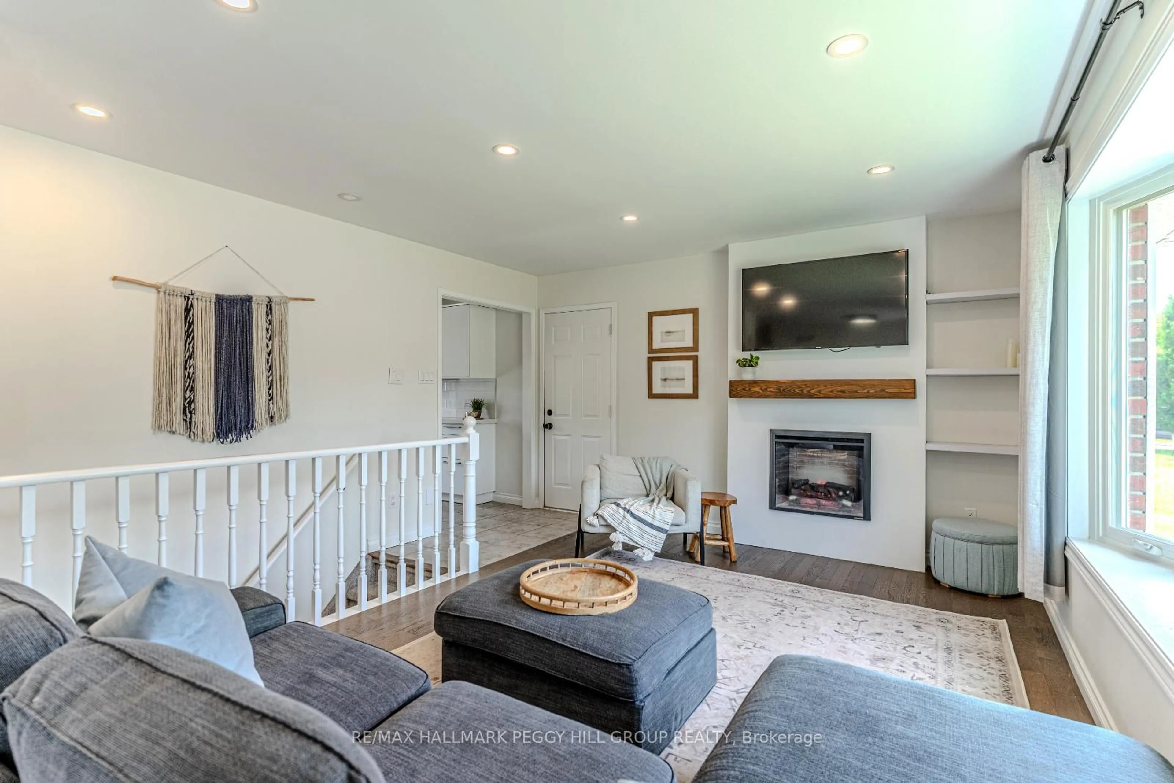 Living room with furniture, unknown for 27 Foyston Park Circ, Springwater Ontario L9X 0A1