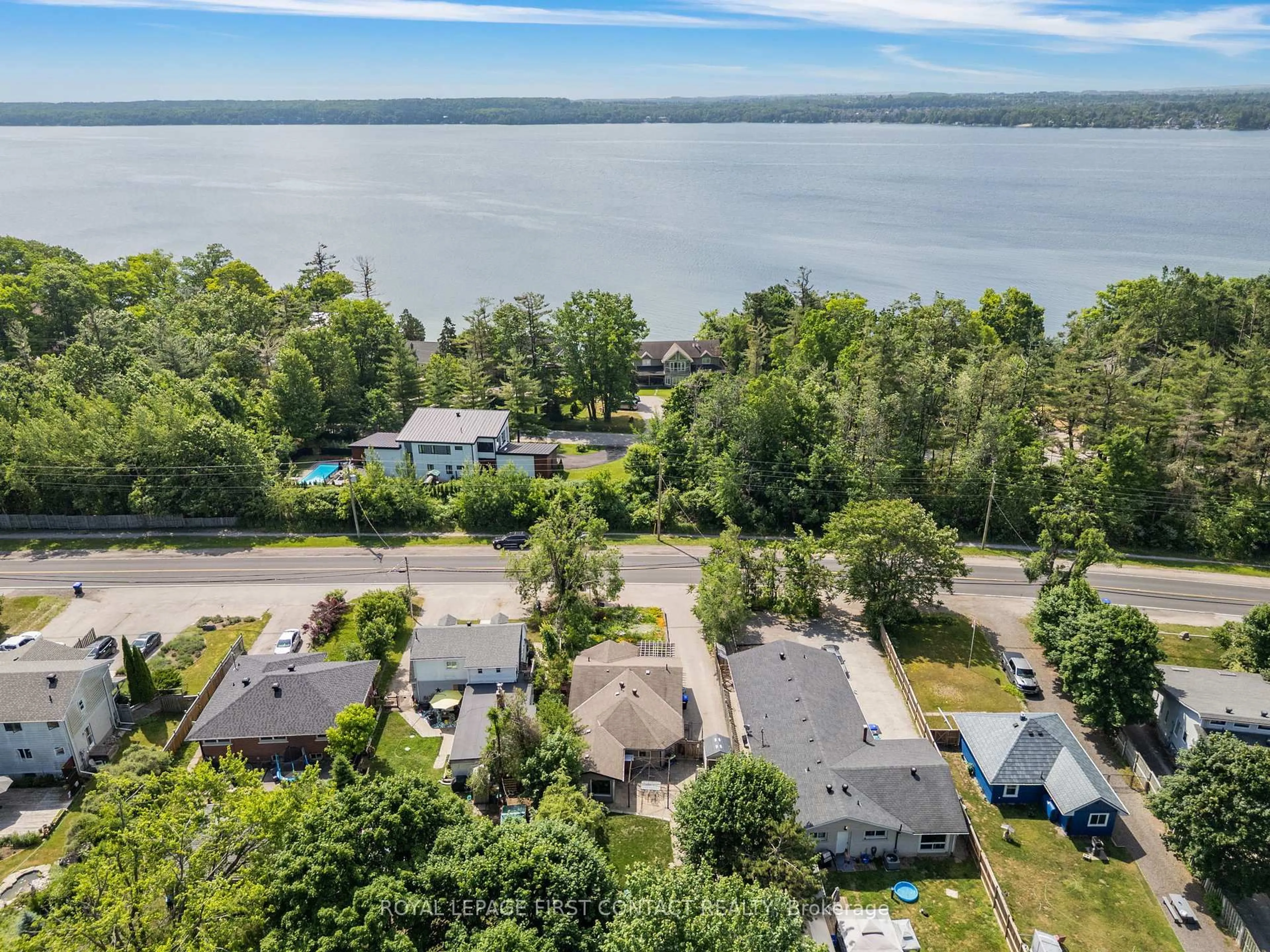 A pic from outside/outdoor area/front of a property/back of a property/a pic from drone, water/lake/river/ocean view for 318 Shanty Bay Rd Rd, Oro-Medonte Ontario L4M 1E7