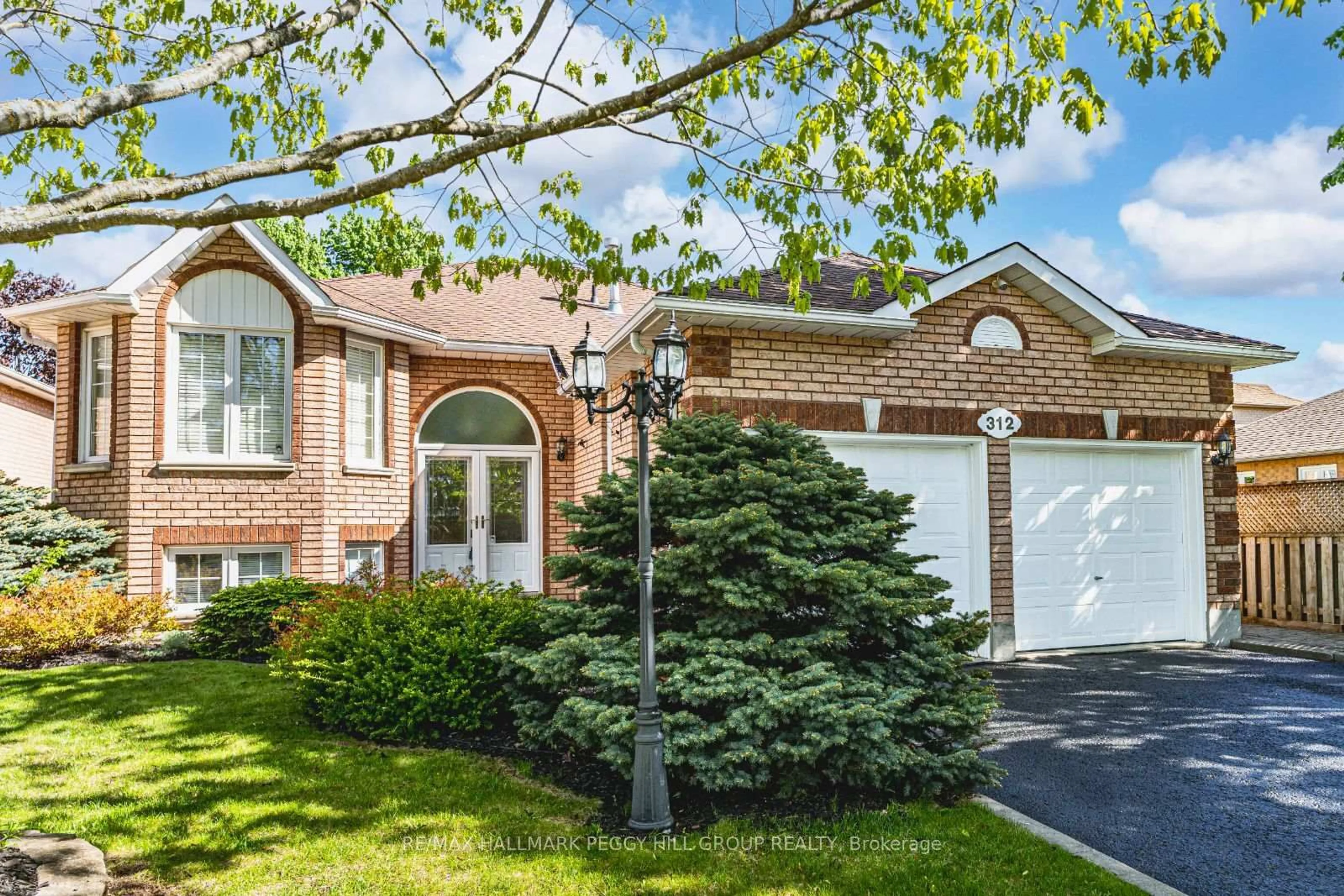 Home with brick exterior material, street for 312 Harvie Rd, Barrie Ontario L4N 8H1