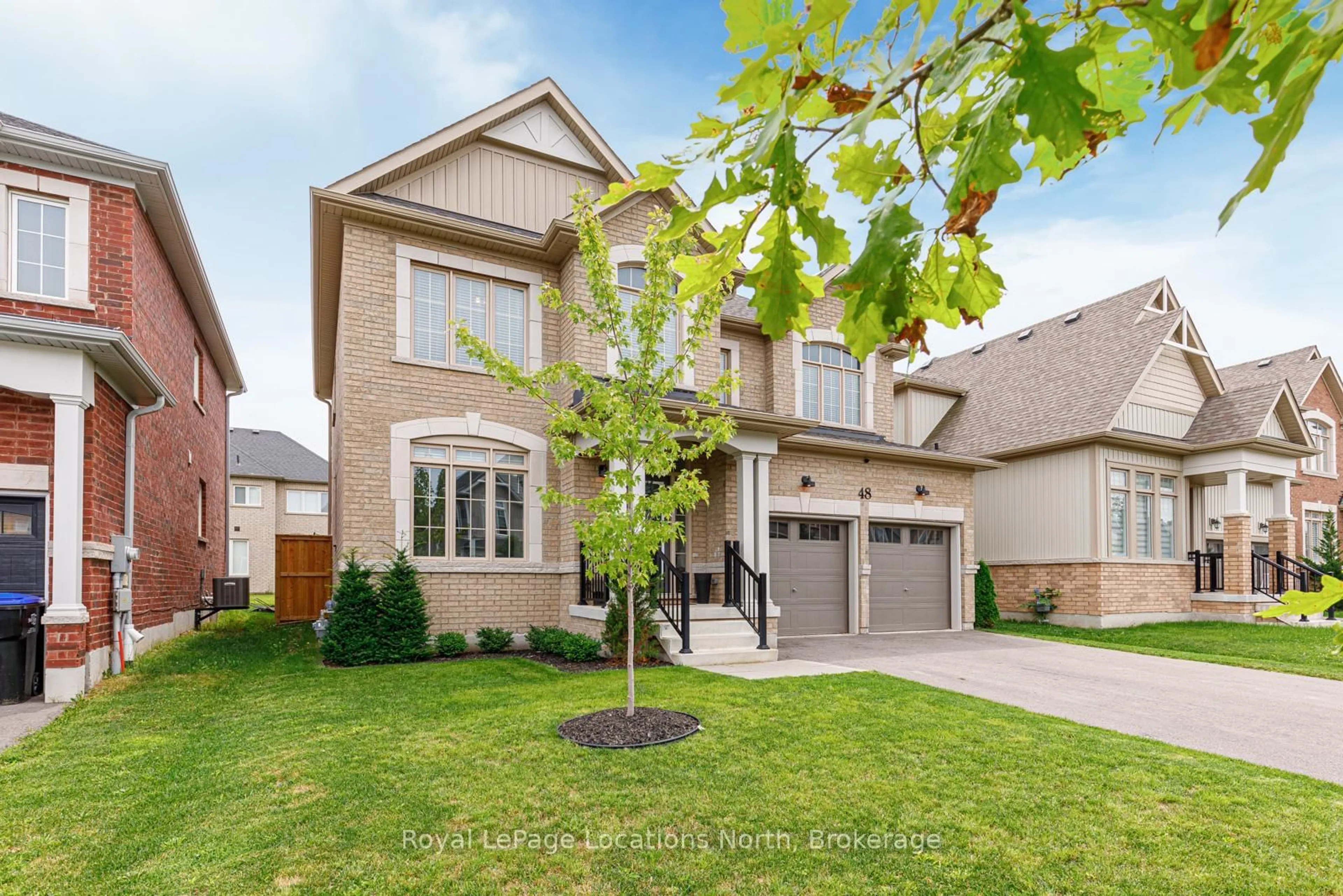 Home with brick exterior material, street for 48 Mclean Ave, Collingwood Ontario L9Y 3Z6