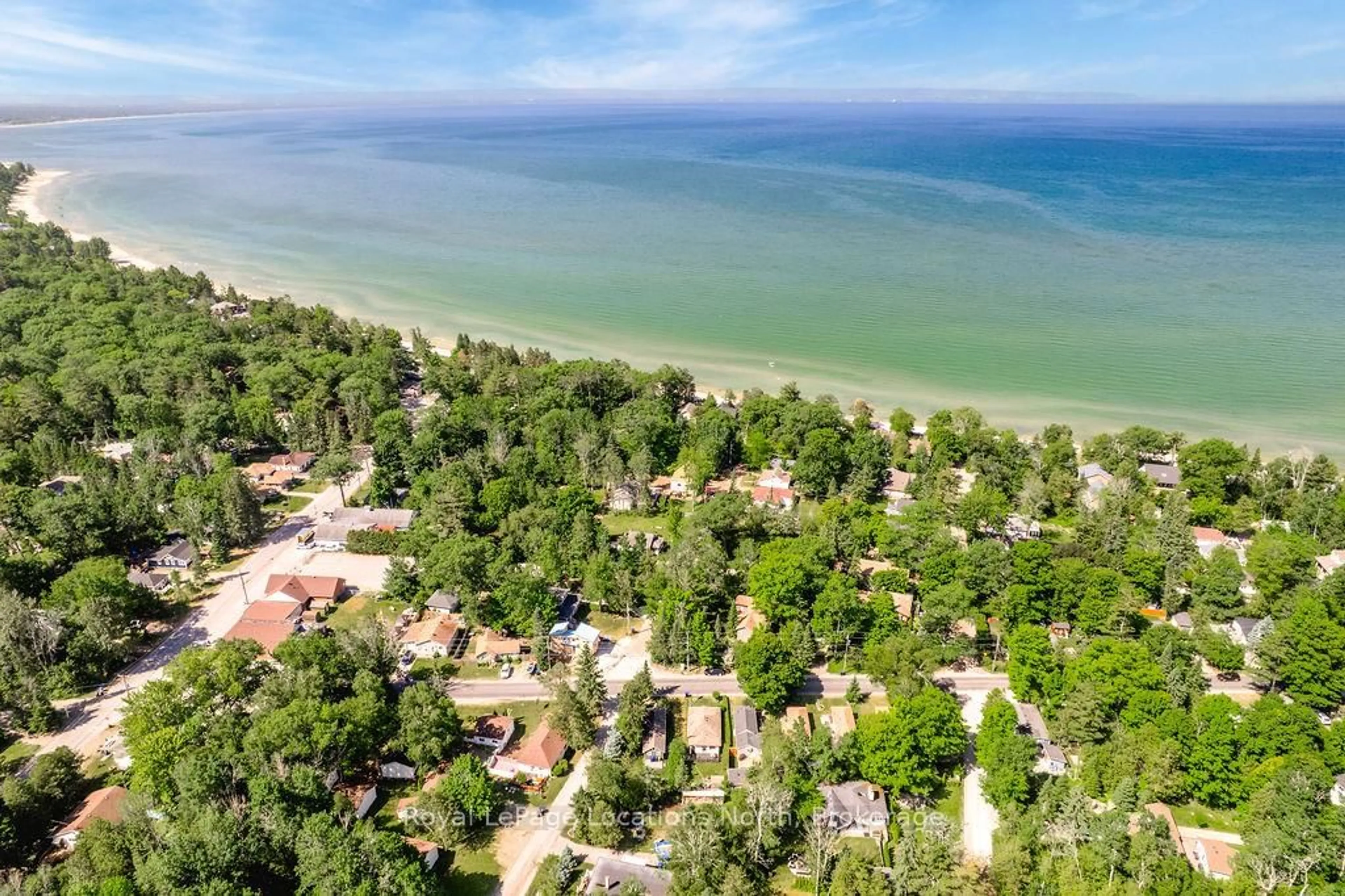 A pic from outside/outdoor area/front of a property/back of a property/a pic from drone, water/lake/river/ocean view for 1981 TINY BEACHES Rd, Tiny Ontario L9M 1R3