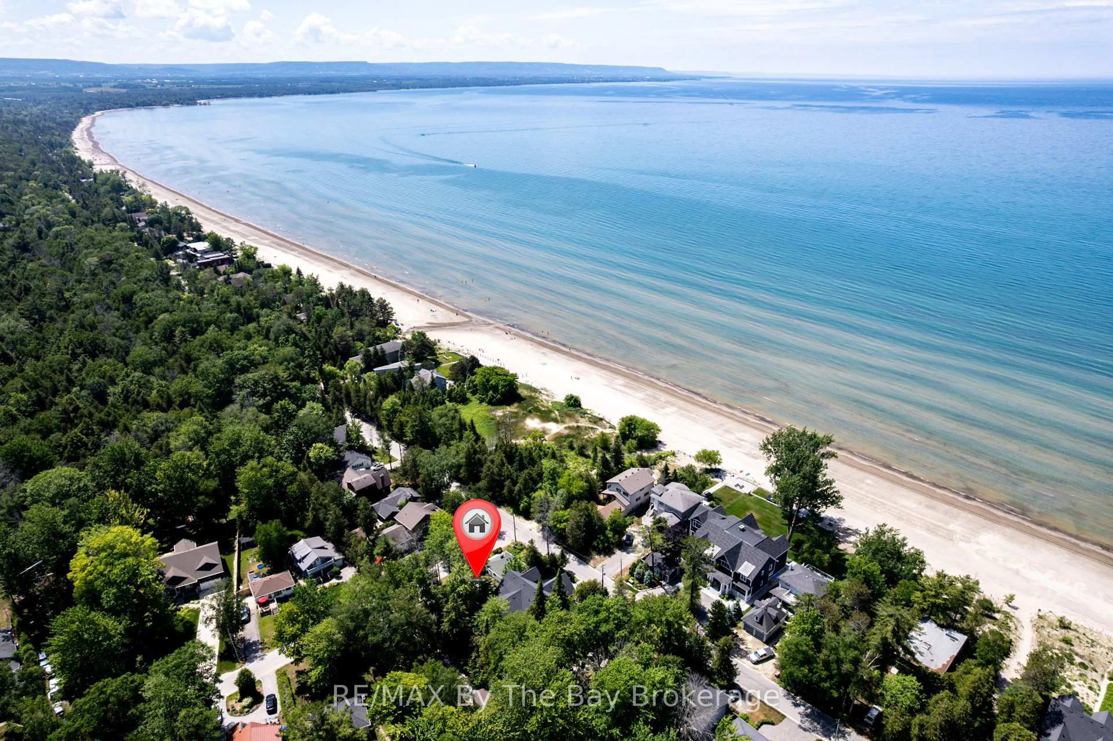 A pic from outside/outdoor area/front of a property/back of a property/a pic from drone, water/lake/river/ocean view for 1105 Shore Lane, Wasaga Beach Ontario L9Z 1Z8