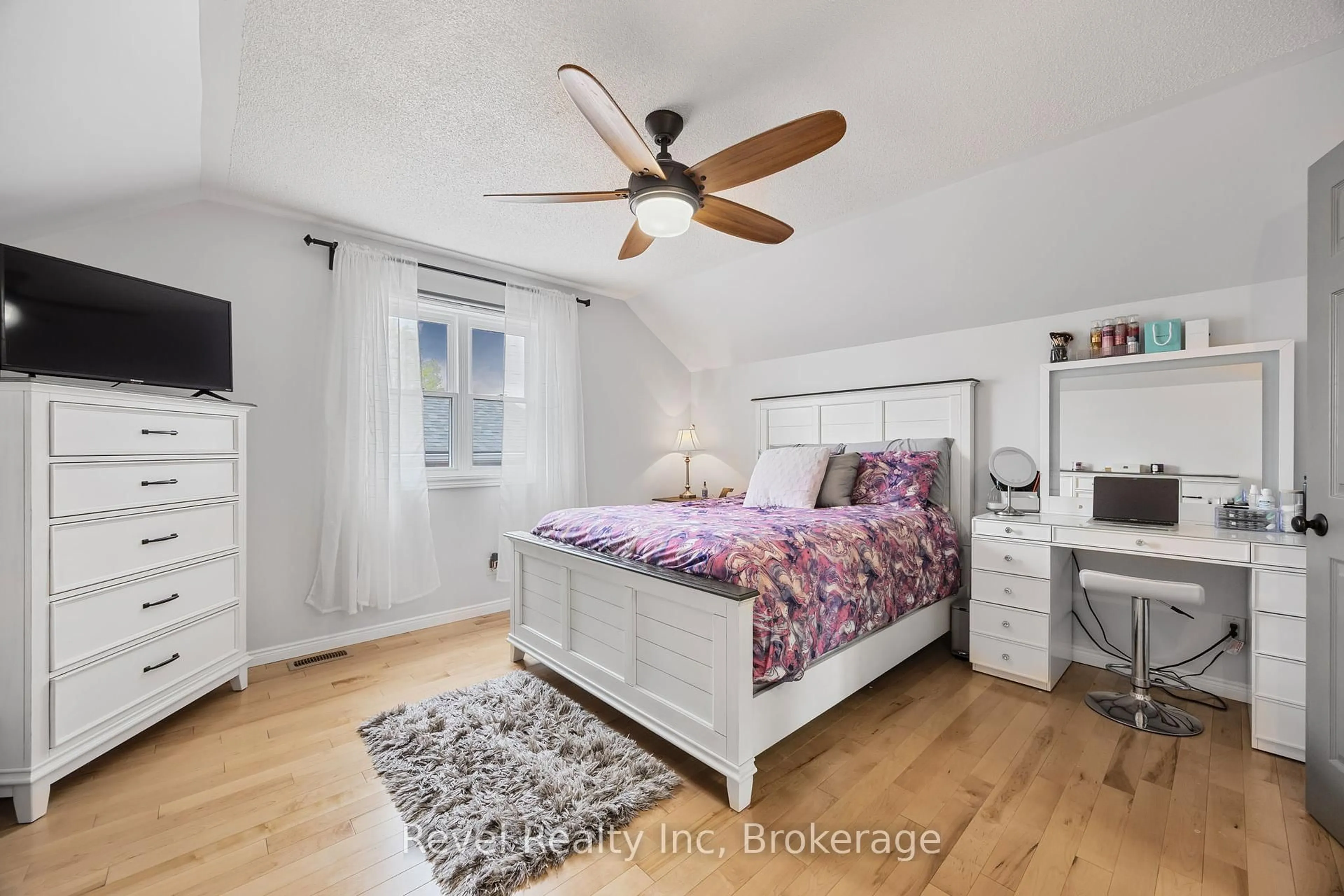 Bedroom with bed, wood/laminate floor for 894 MONTREAL St, Midland Ontario L4R 5A7