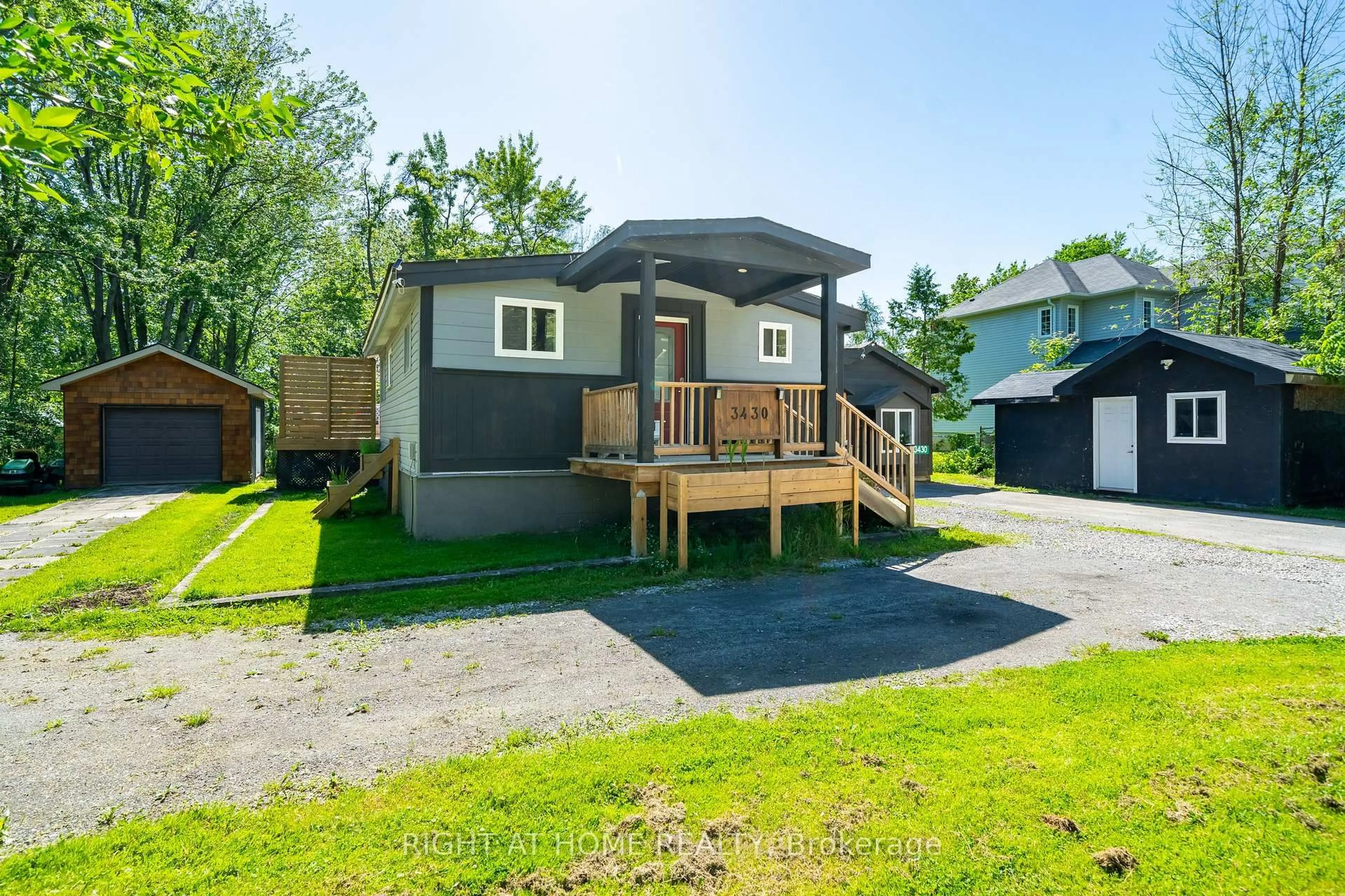 Home with vinyl exterior material, street for 3430 Bayou Rd, Severn Ontario L3V 6H3