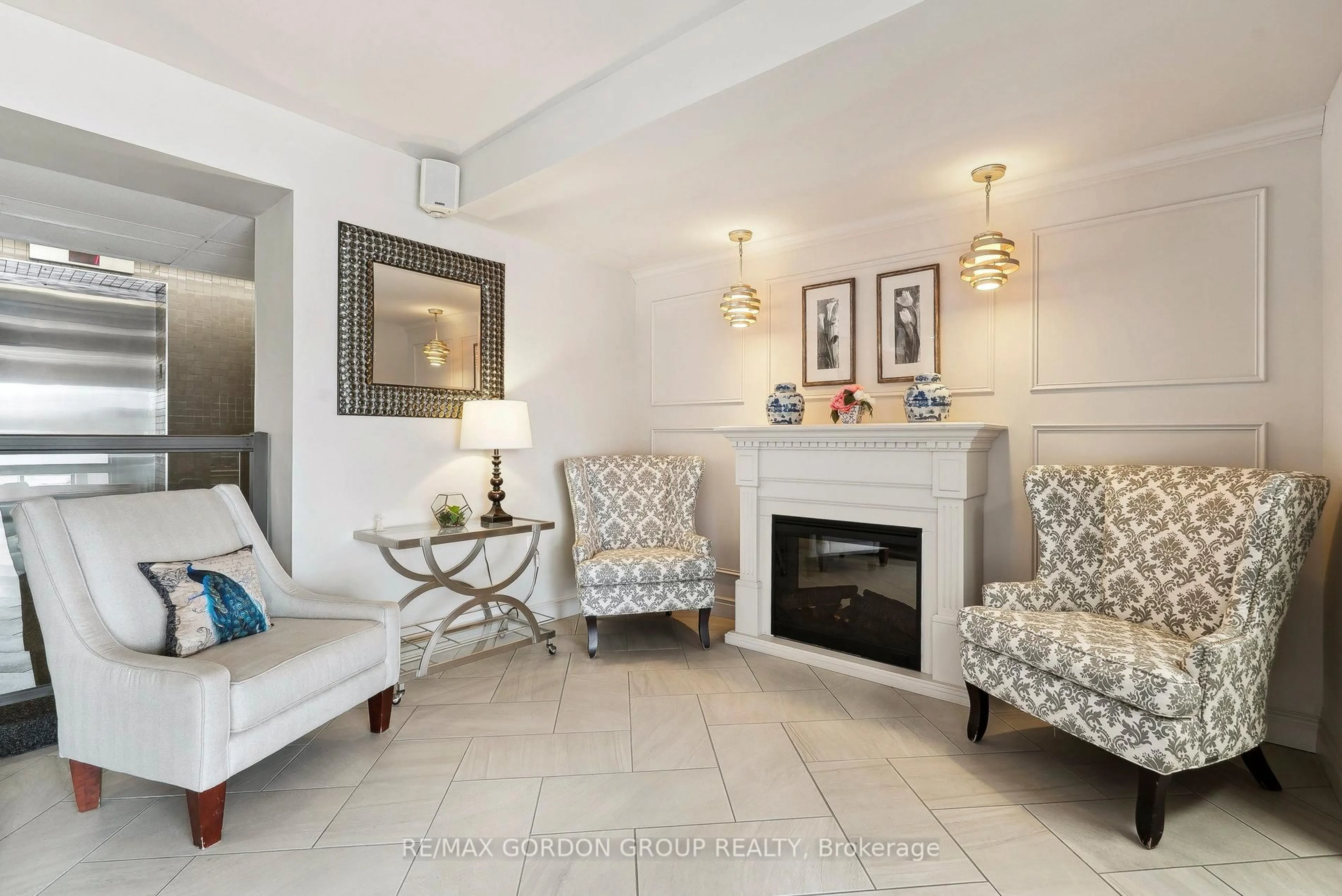 Living room with furniture, ceramic/tile floor for 414 Blake St #601, Barrie Ontario L4M 5J7