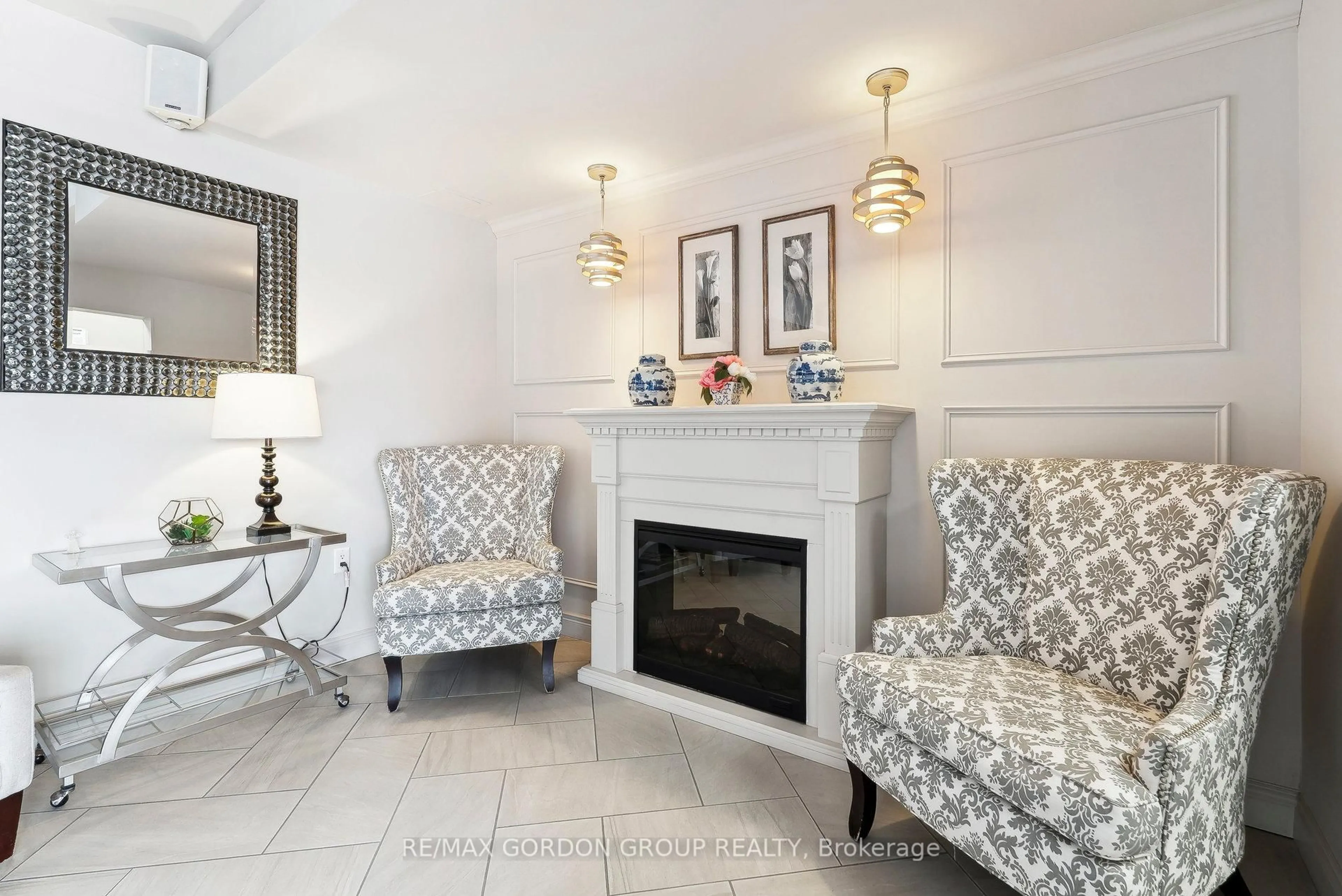 Living room with furniture, ceramic/tile floor for 414 Blake St #601, Barrie Ontario L4M 5J7