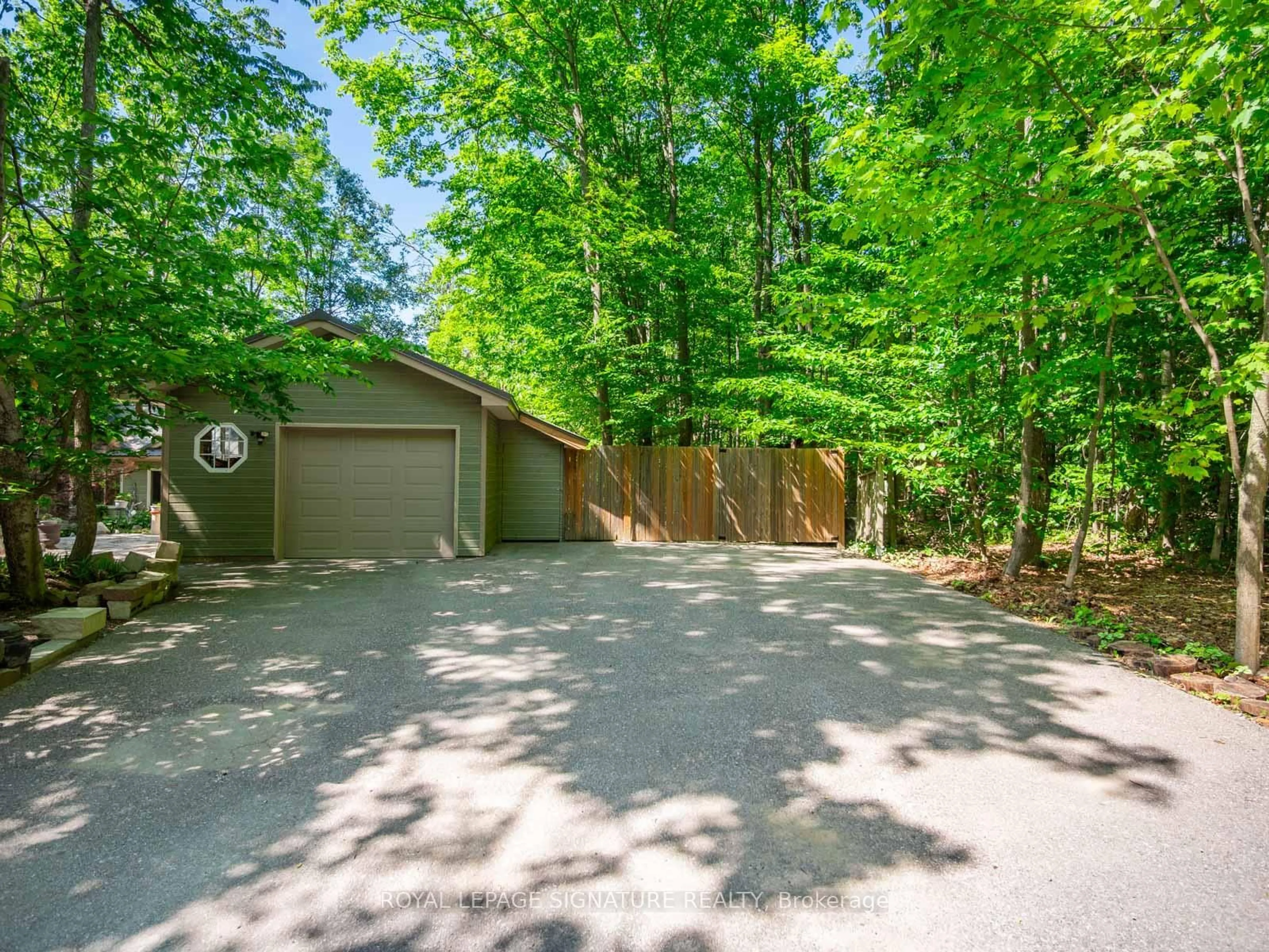 A pic from outside/outdoor area/front of a property/back of a property/a pic from drone, forest/trees view for 22 Iroquois Rdge, Oro-Medonte Ontario L0K 1E0