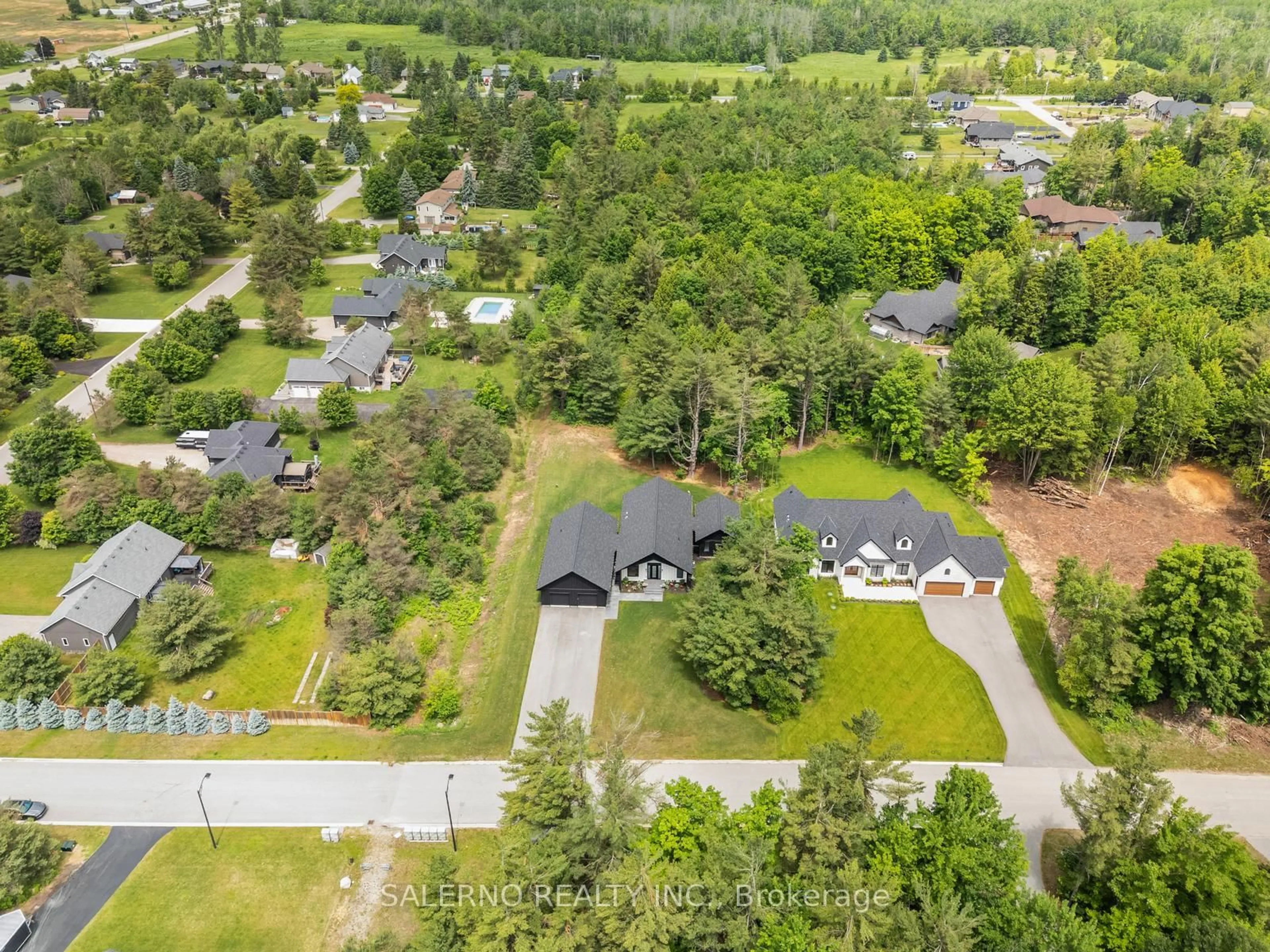 A pic from outside/outdoor area/front of a property/back of a property/a pic from drone, unknown for 31 Marni Lane, Springwater Ontario L0L 2K0