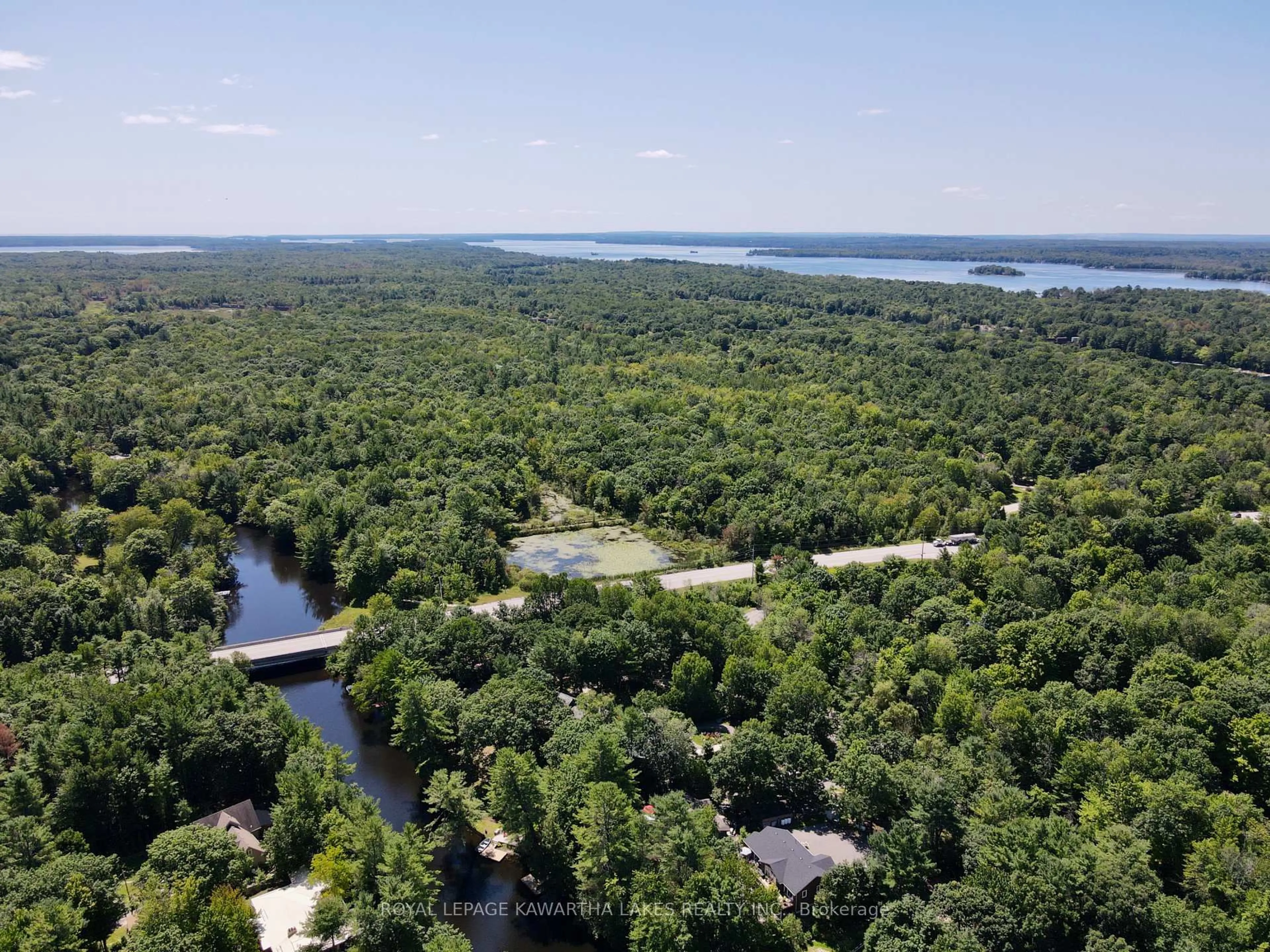 A pic from outside/outdoor area/front of a property/back of a property/a pic from drone, water/lake/river/ocean view for 7692 Birch Dr, Ramara Ontario L0K 2B0