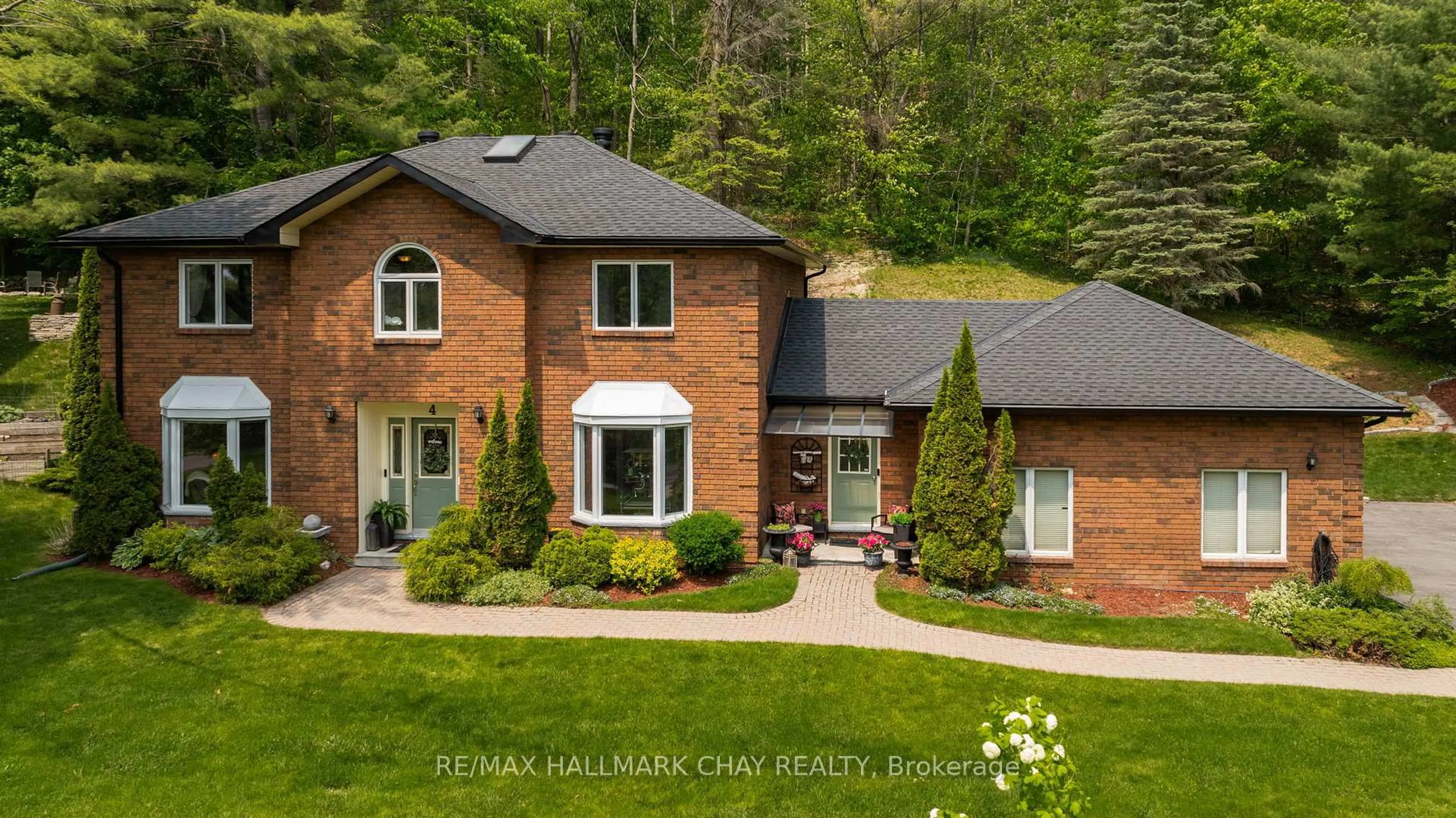 Home with brick exterior material, street for 4 IDLEWOOD Dr, Springwater Ontario L0L 1X1