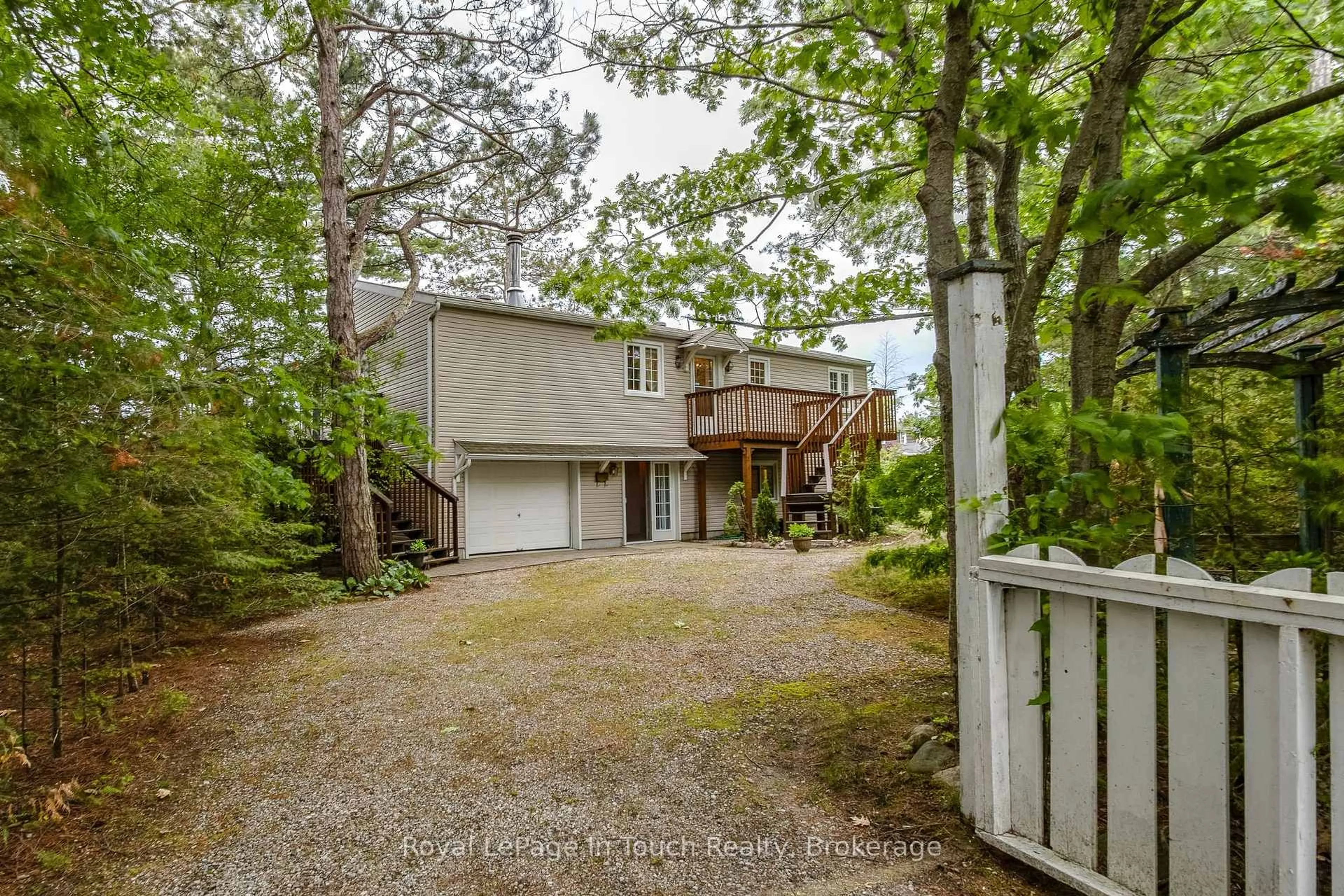 A pic from outside/outdoor area/front of a property/back of a property/a pic from drone, street for 1430 Tiny Beaches Rd, Tiny Ontario L9M 1R3