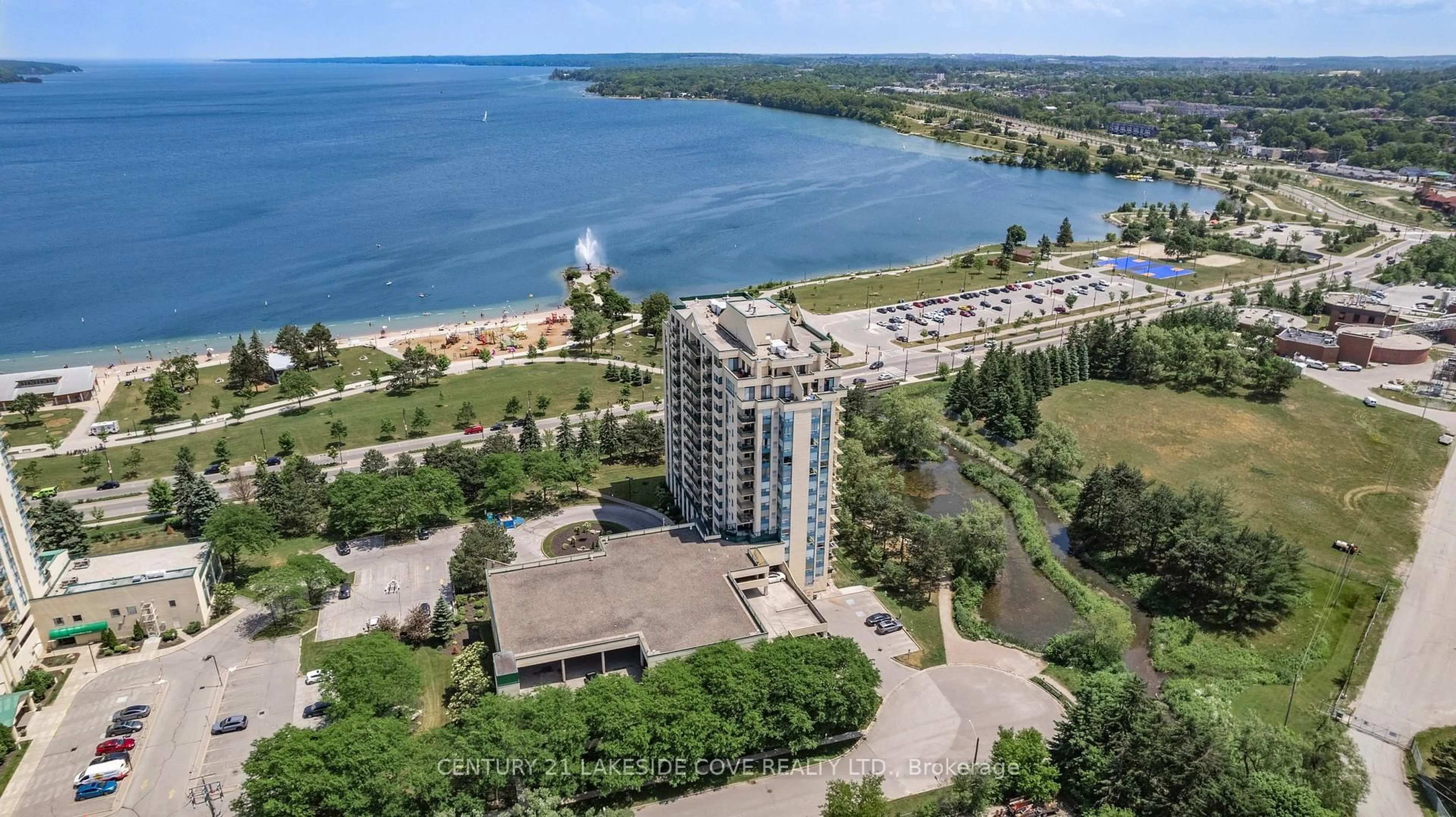 A pic from outside/outdoor area/front of a property/back of a property/a pic from drone, water/lake/river/ocean view for 75 Ellen St #711, Barrie Ontario L4N 7R6