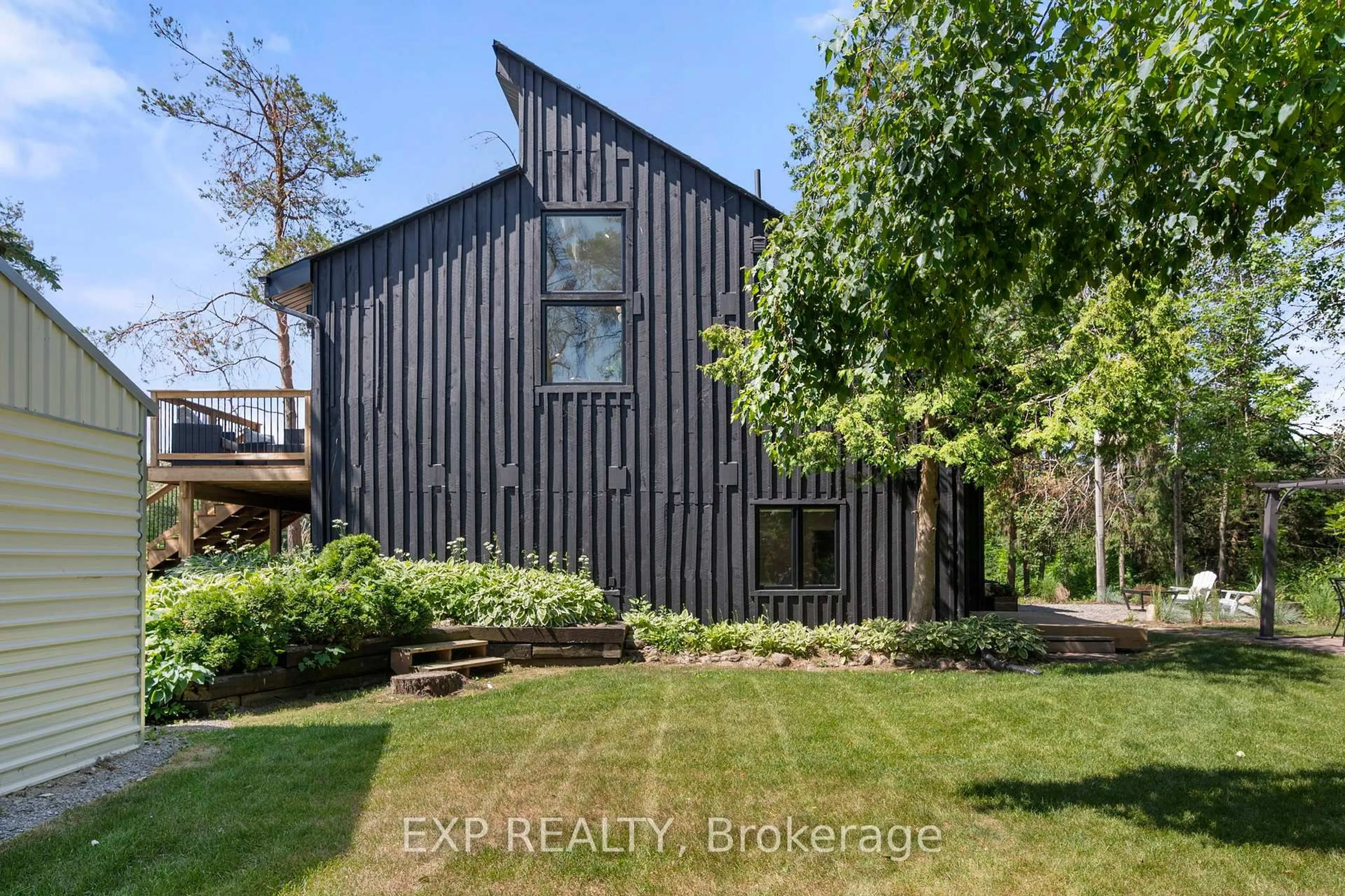 A pic from outside/outdoor area/front of a property/back of a property/a pic from drone, unknown for 24 Shelswell Blvd, Oro-Medonte Ontario L0L 2E0
