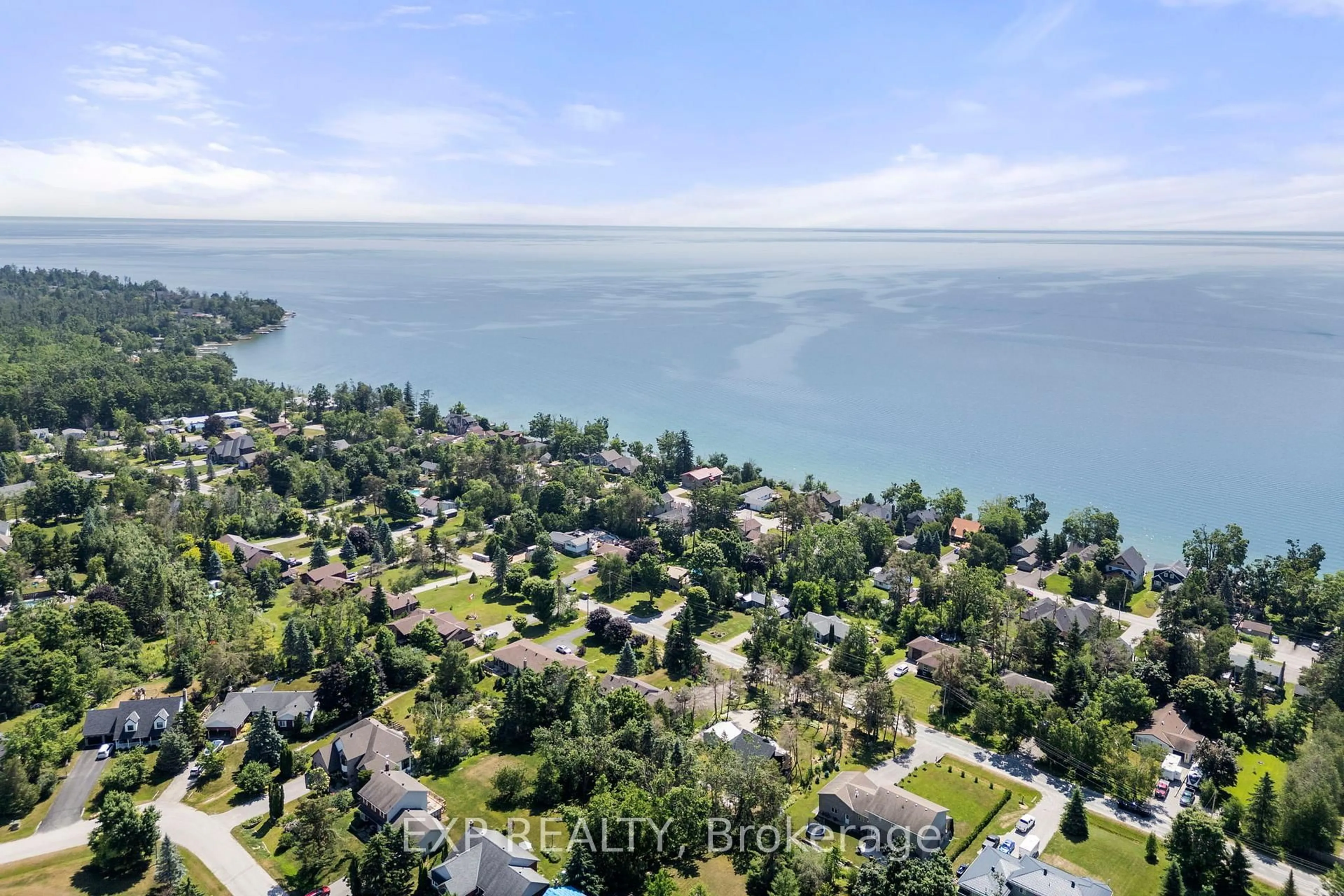 A pic from outside/outdoor area/front of a property/back of a property/a pic from drone, water/lake/river/ocean view for 24 Shelswell Blvd, Oro-Medonte Ontario L0L 2E0