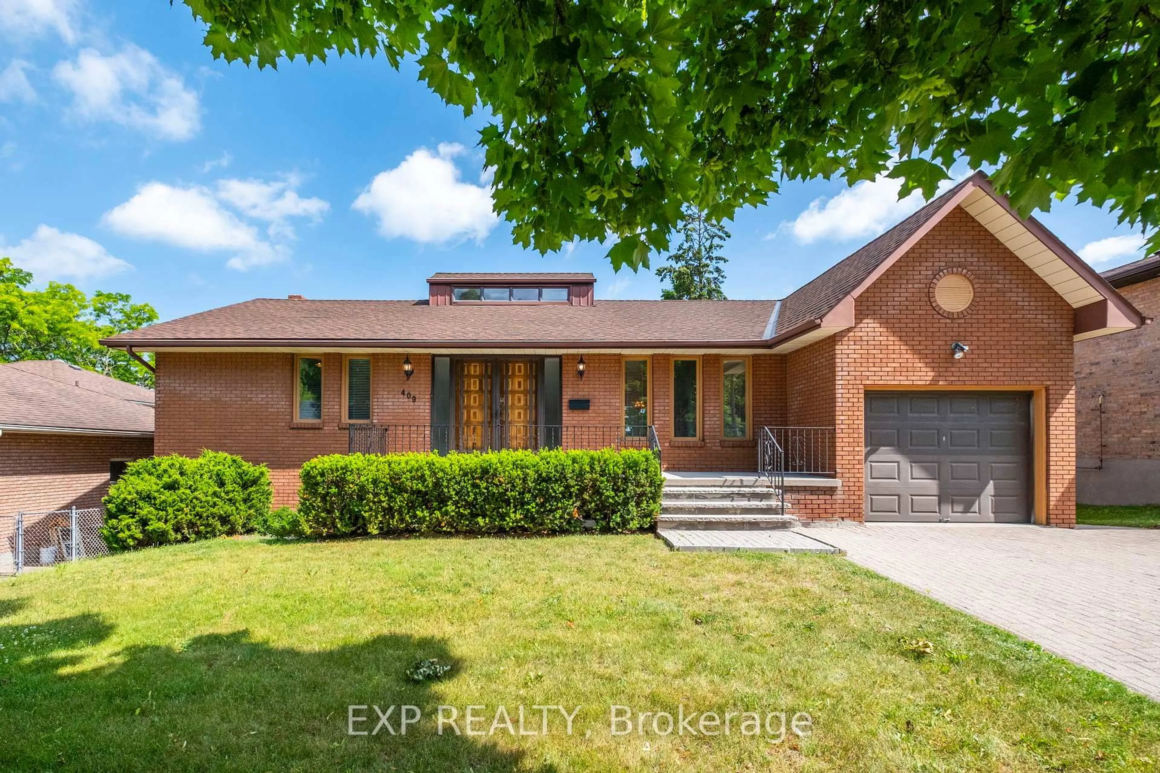 Home with brick exterior material, street for 409 Innisfil St, Barrie Ontario L4N 3G7