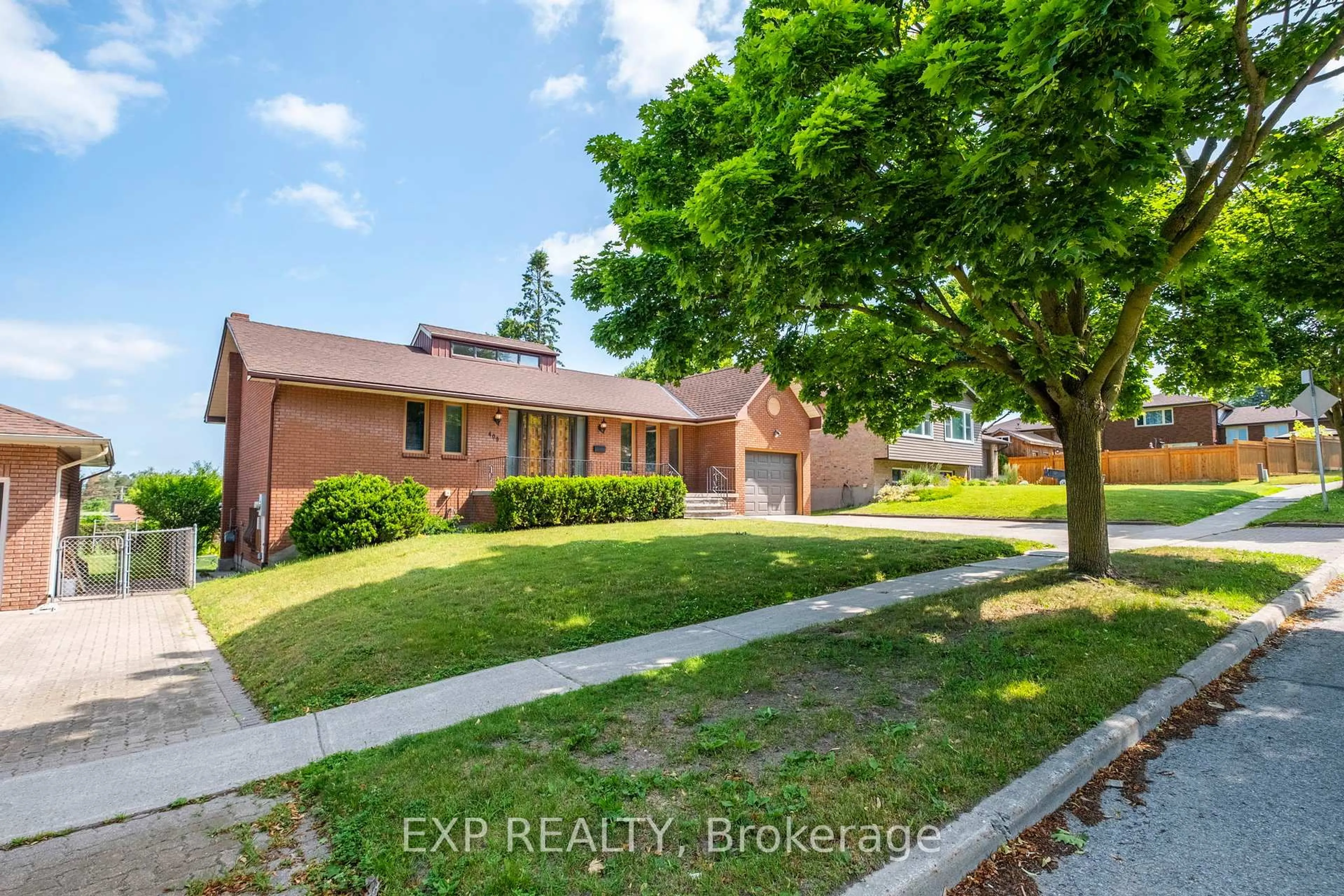 Home with brick exterior material, street for 409 Innisfil St, Barrie Ontario L4N 3G7