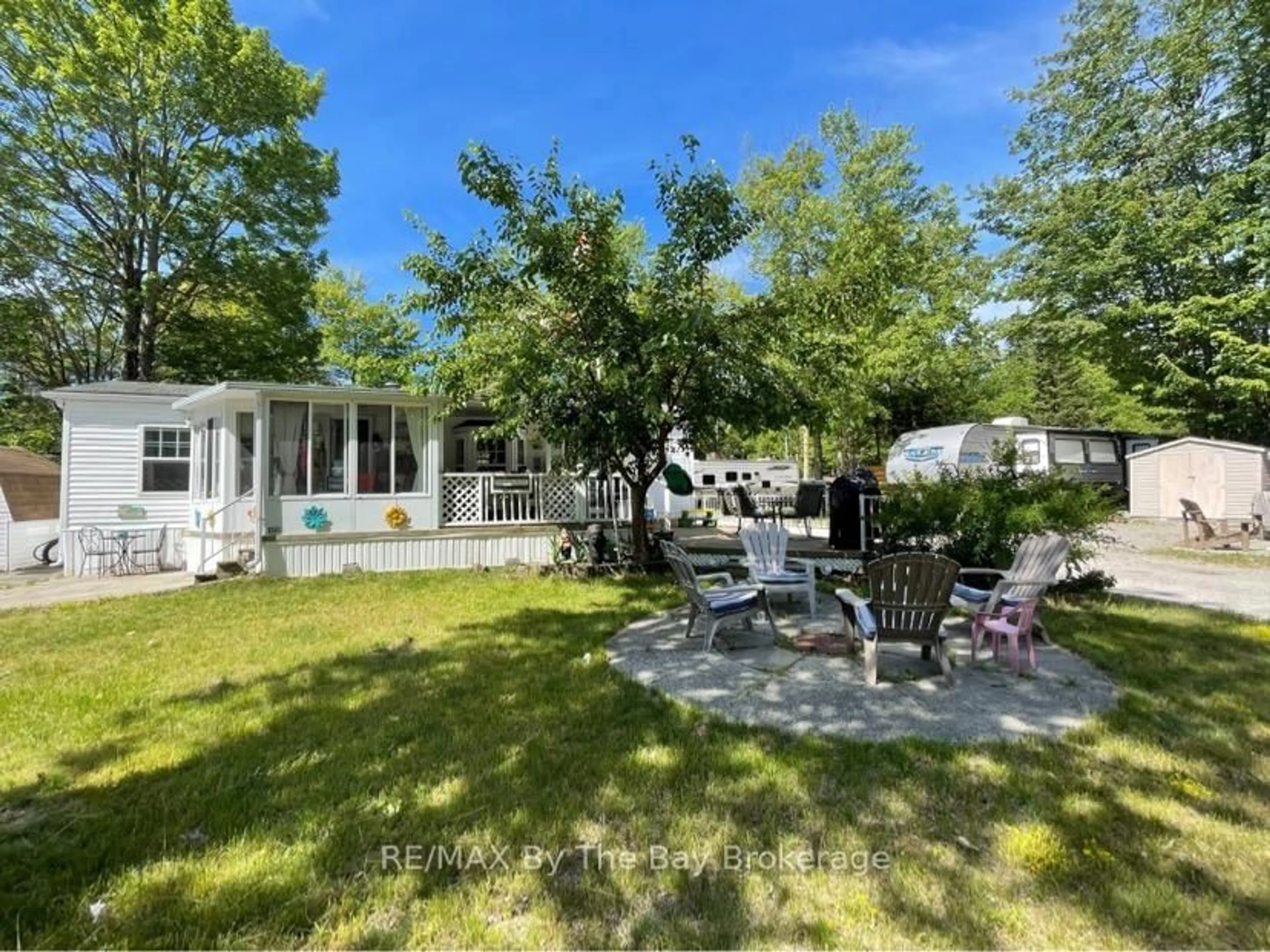 A pic from outside/outdoor area/front of a property/back of a property/a pic from drone, water/lake/river/ocean view for 85 THEME PARK Dr #173, Wasaga Beach Ontario L9Z 1X7