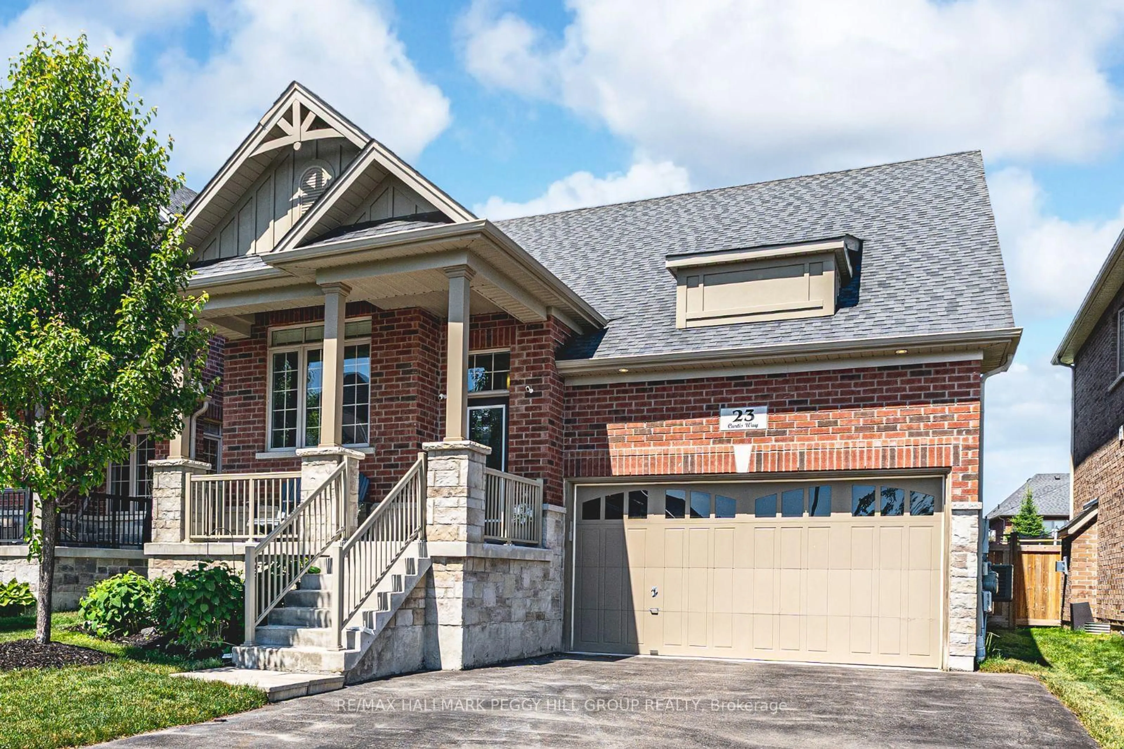 Home with brick exterior material, street for 23 Curtis Way, Springwater Ontario L9X 0S7