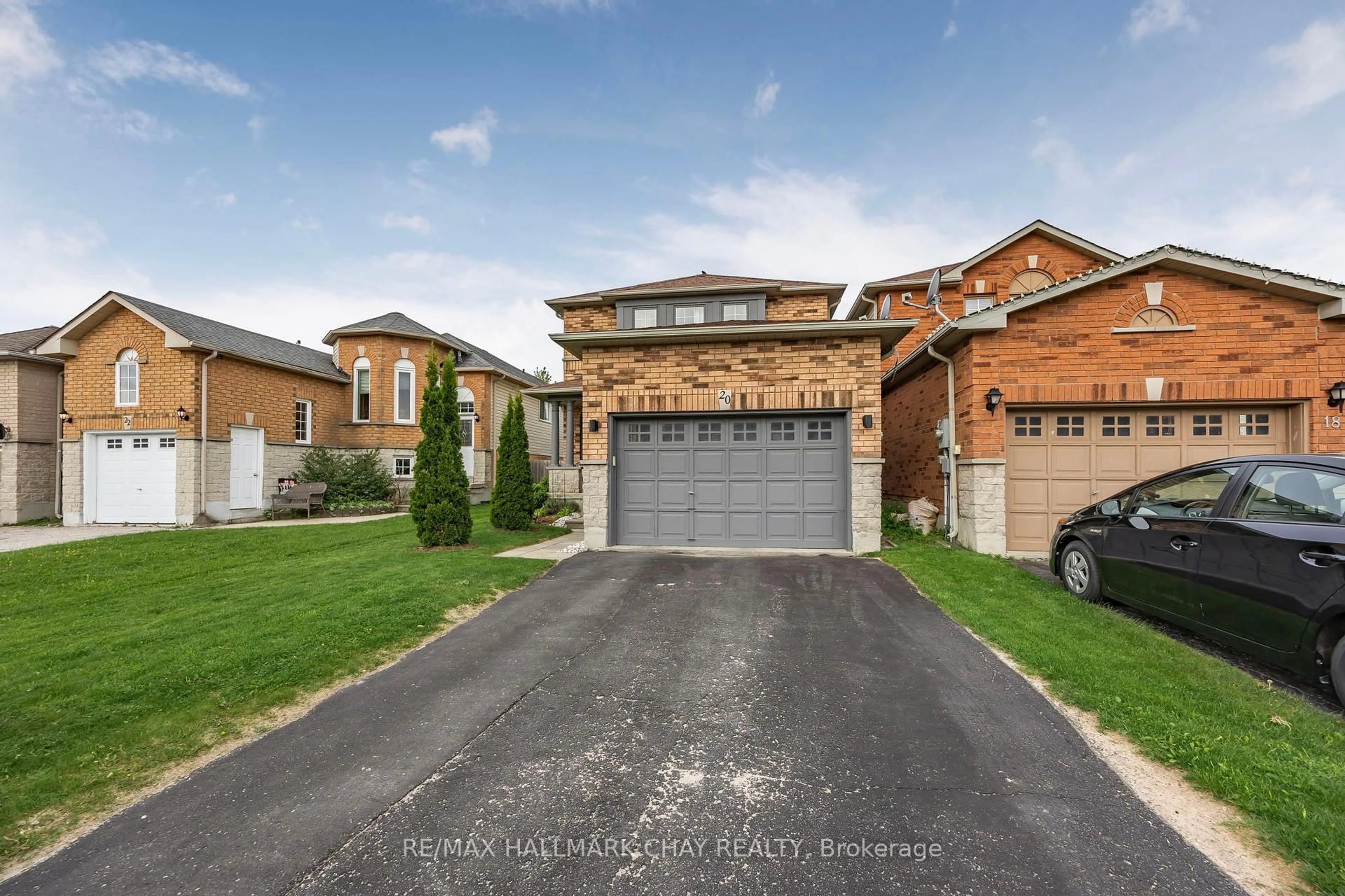 Home with brick exterior material, street for 20 BASSWOOD Dr, Barrie Ontario L4N 9P1