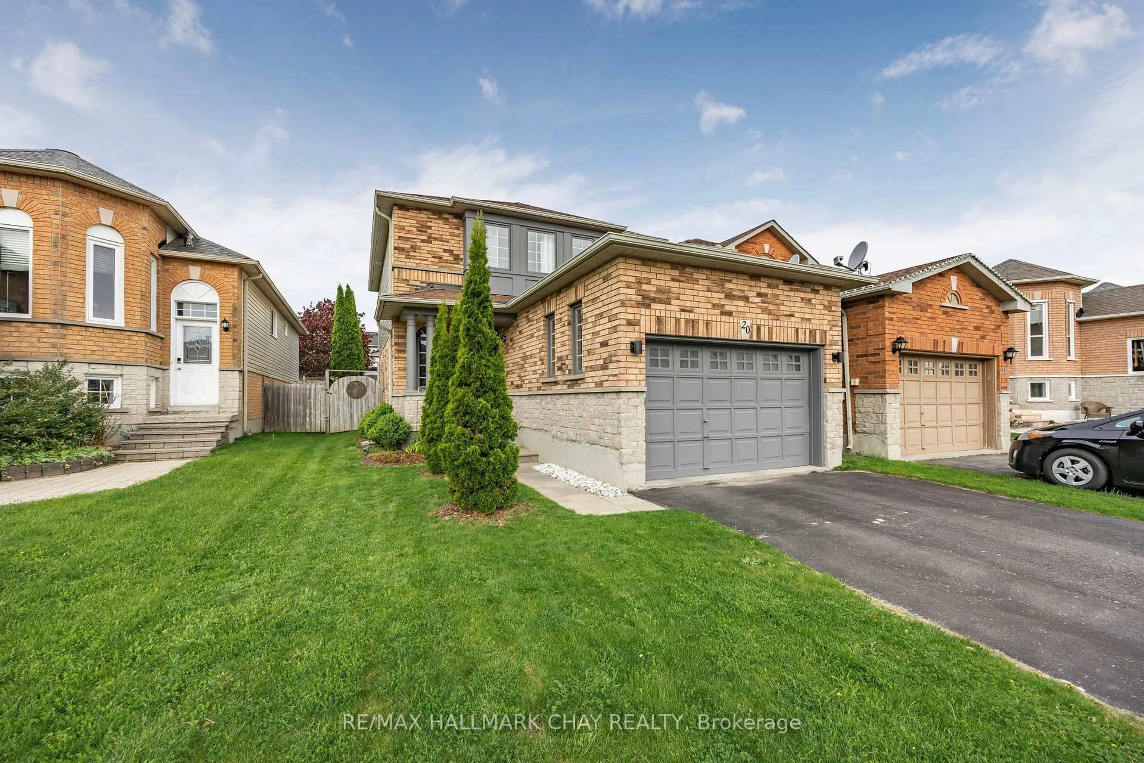 Home with brick exterior material, street for 20 BASSWOOD Dr, Barrie Ontario L4N 9P1