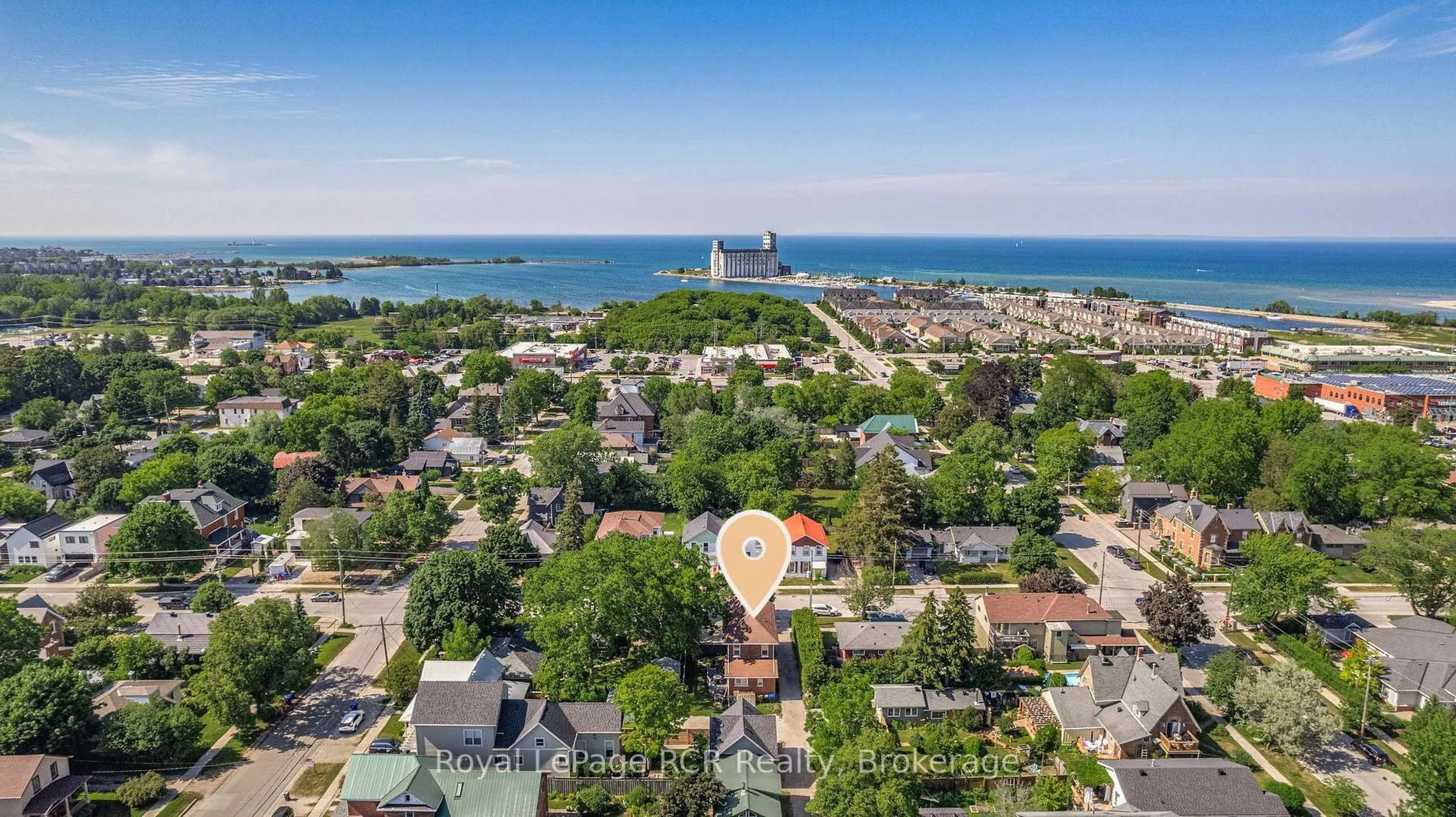 A pic from outside/outdoor area/front of a property/back of a property/a pic from drone, water/lake/river/ocean view for 130 Second St, Collingwood Ontario L9Y 1E8