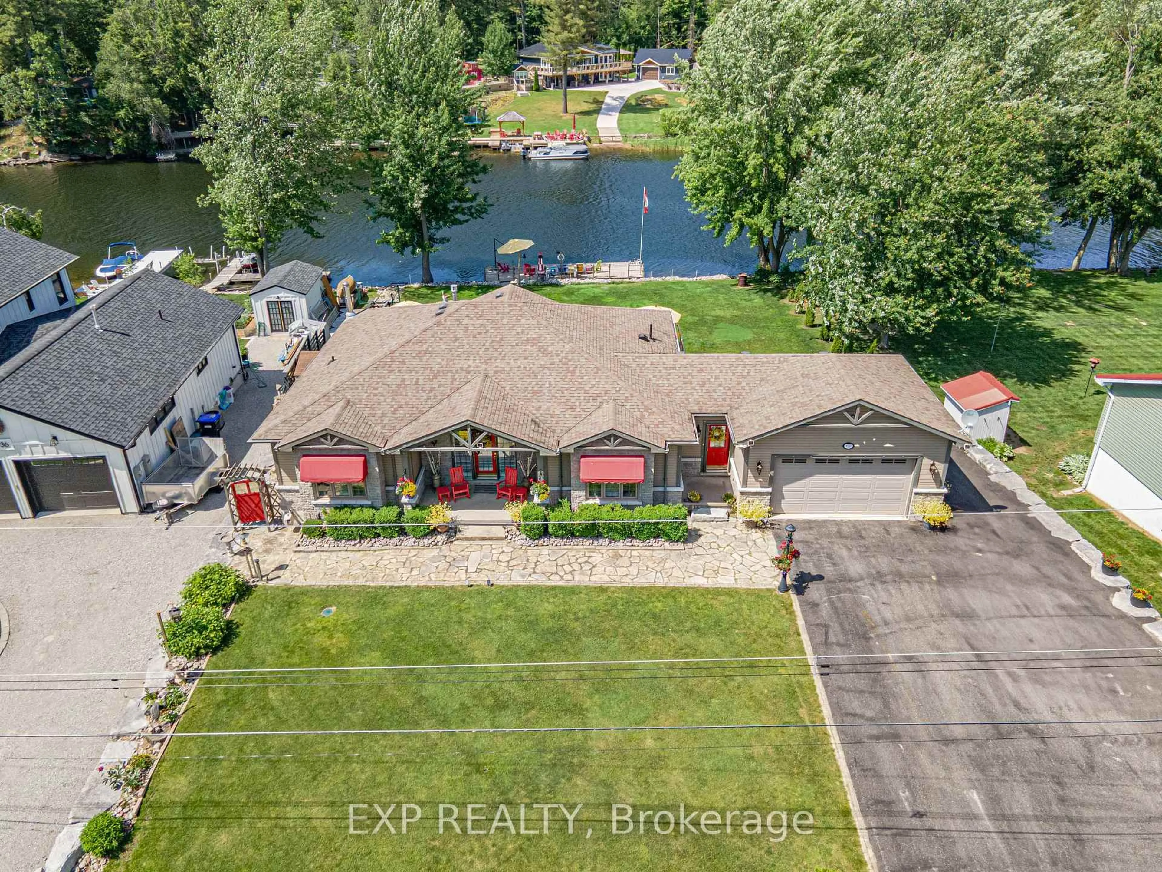 A pic from outside/outdoor area/front of a property/back of a property/a pic from drone, water/lake/river/ocean view for 3940 Canal Rd, Severn Ontario L0K 2B0