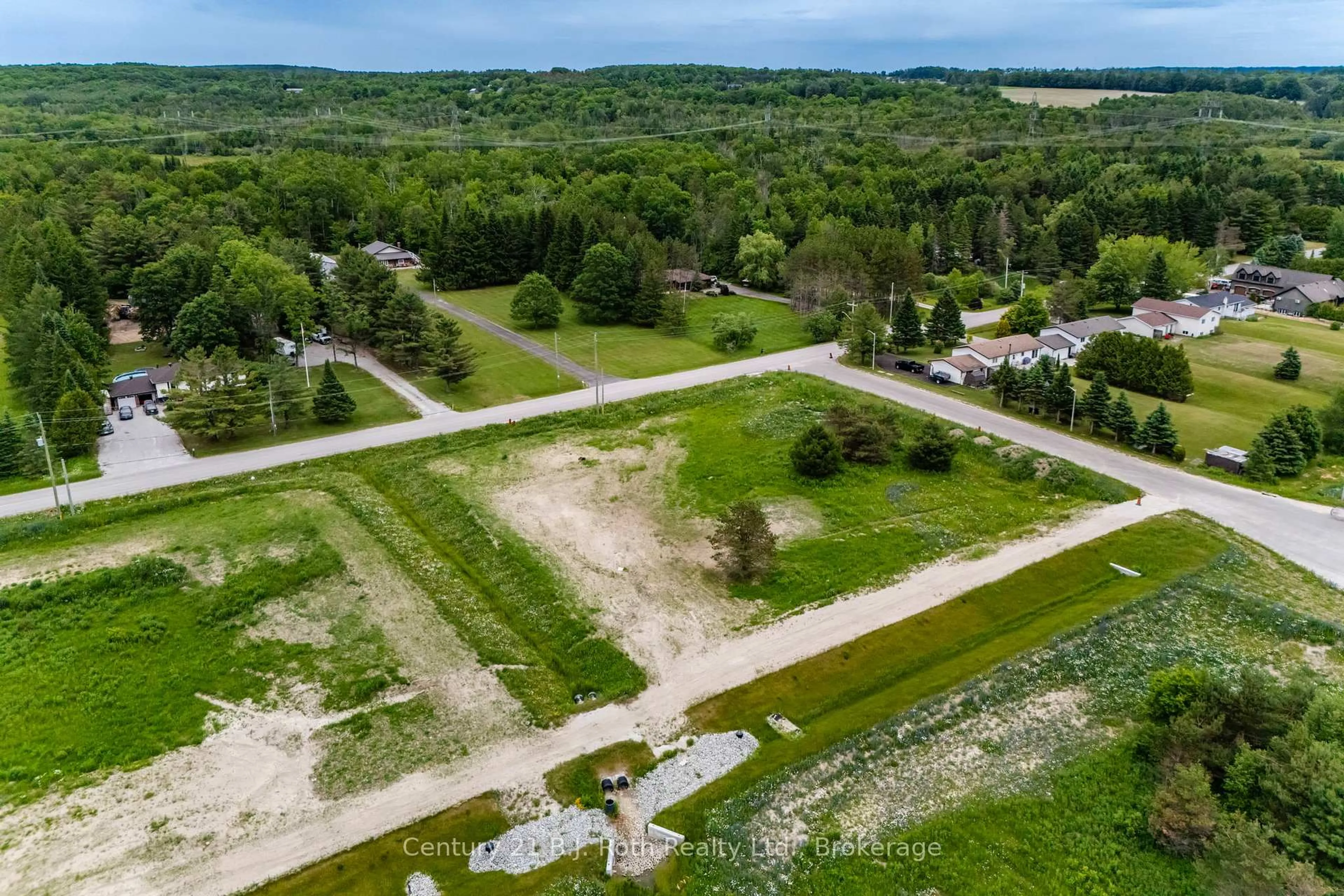 A pic from outside/outdoor area/front of a property/back of a property/a pic from drone, unknown for 7 Scarlett Line, Springwater Ontario L0L 1V0