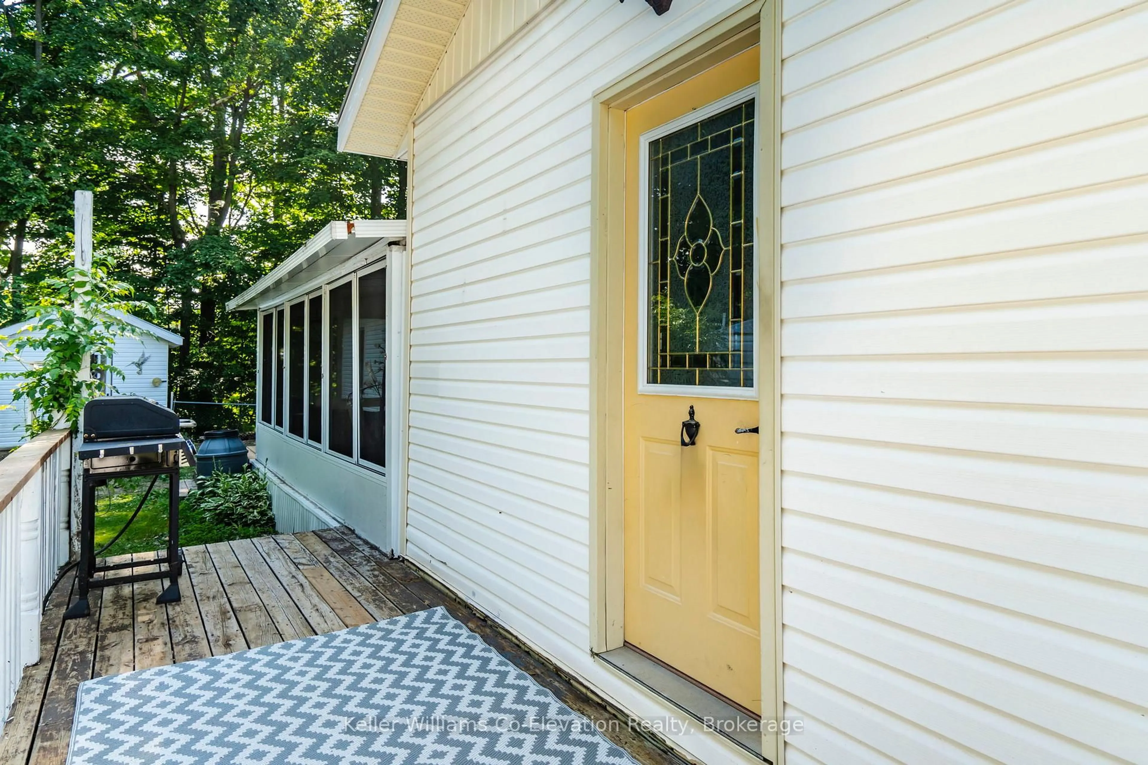 Home with vinyl exterior material, street for 5263 Elliott Sdrd #51, Tay Ontario L4R 4K3