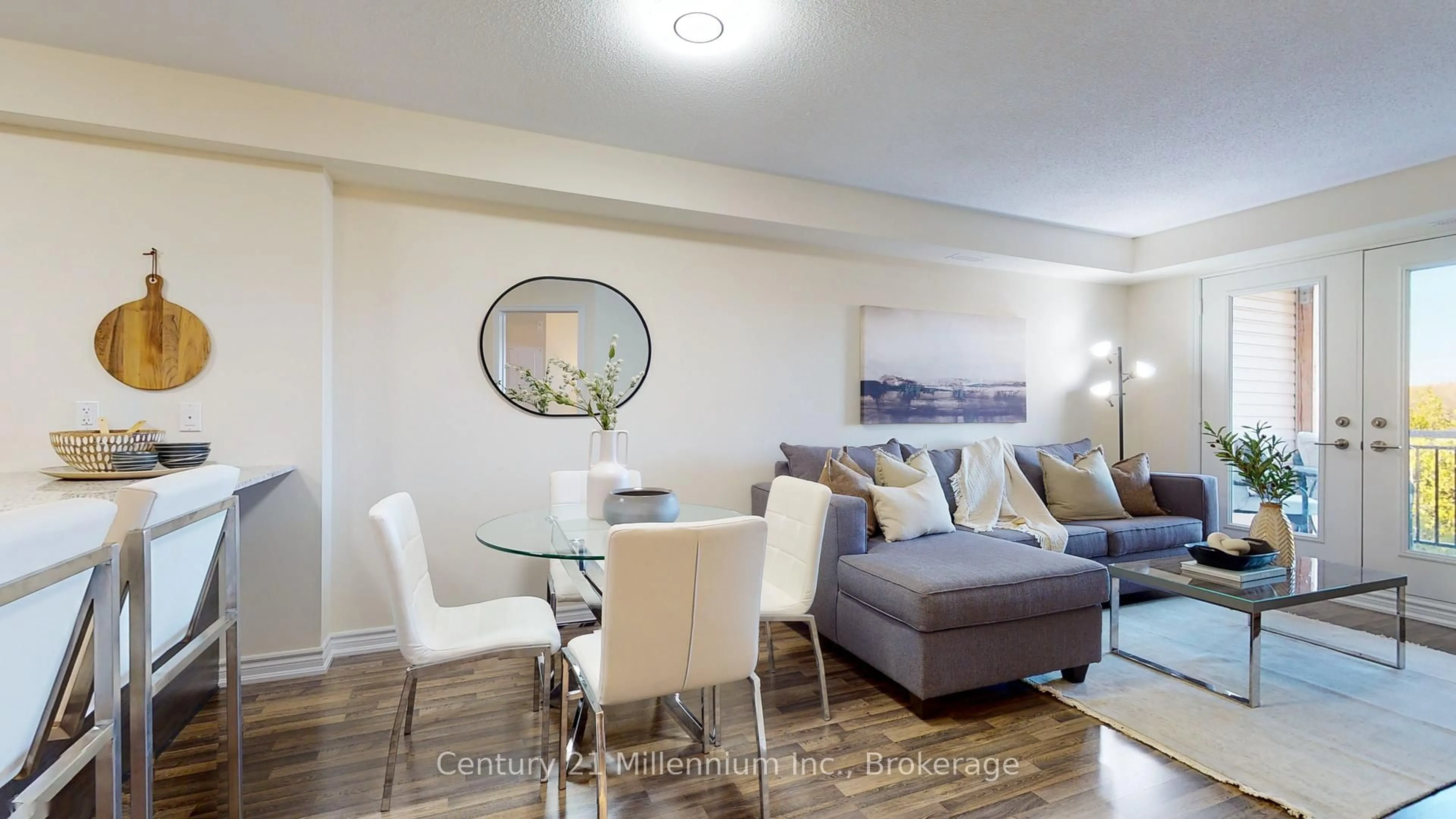 Living room with furniture, wood/laminate floor for 6 Anchorage Cres #205, Collingwood Ontario L9Y 0Y6