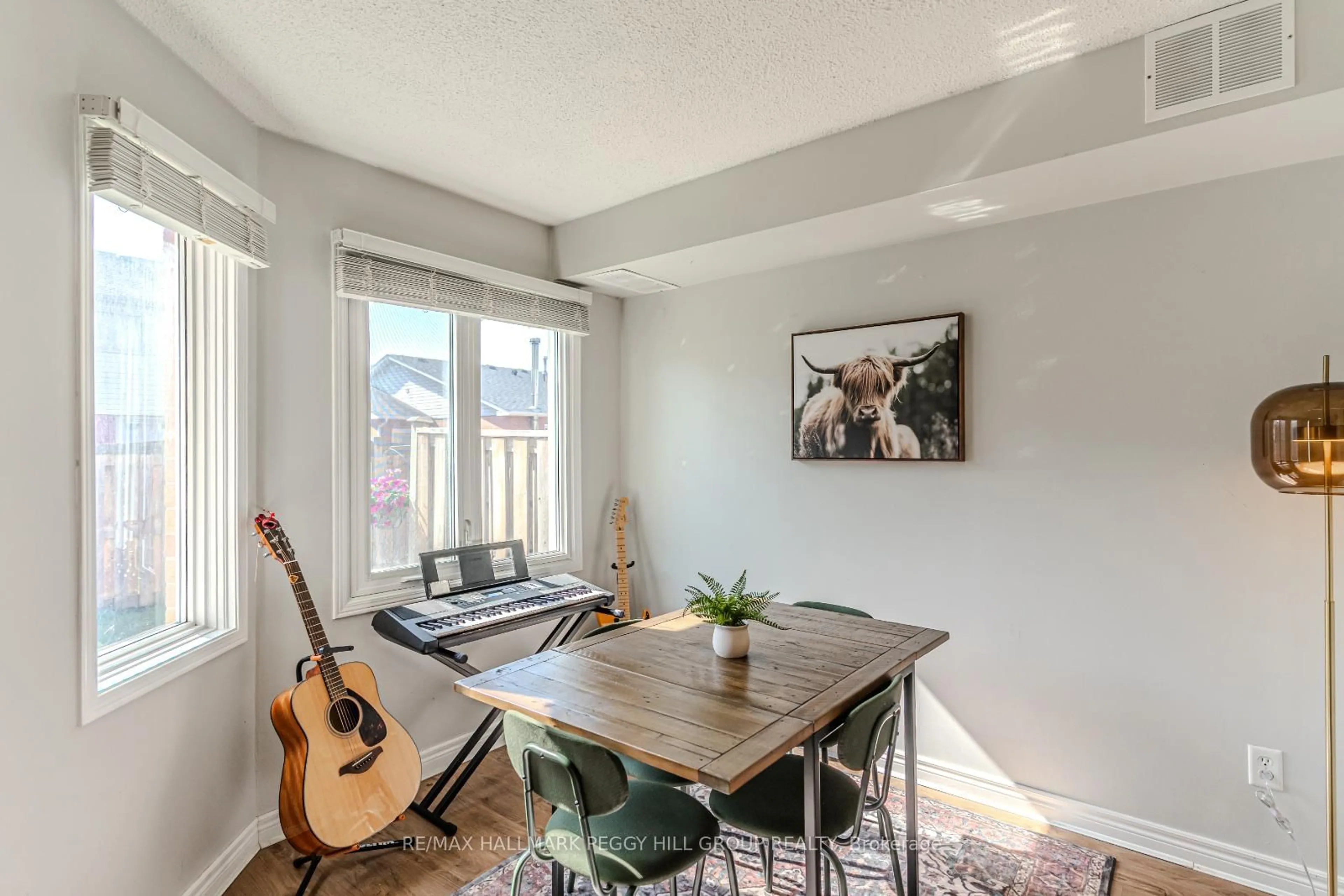 Dining room, wood/laminate floor for 502 Essa Rd #15, Barrie Ontario L4N 7L4