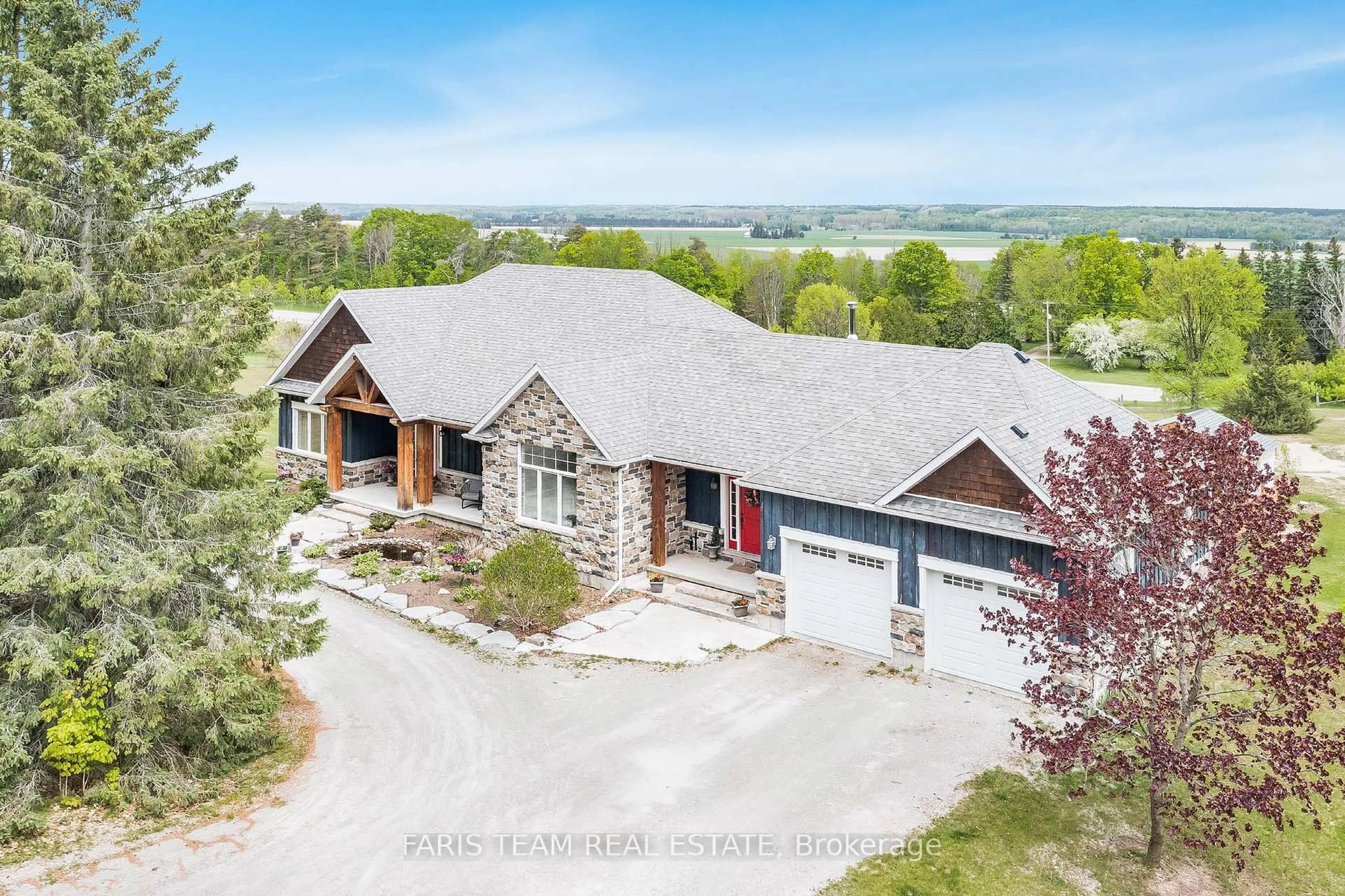 A pic from outside/outdoor area/front of a property/back of a property/a pic from drone, water/lake/river/ocean view for 1933 Vespra Valley Rd, Springwater Ontario L0L 1Y2