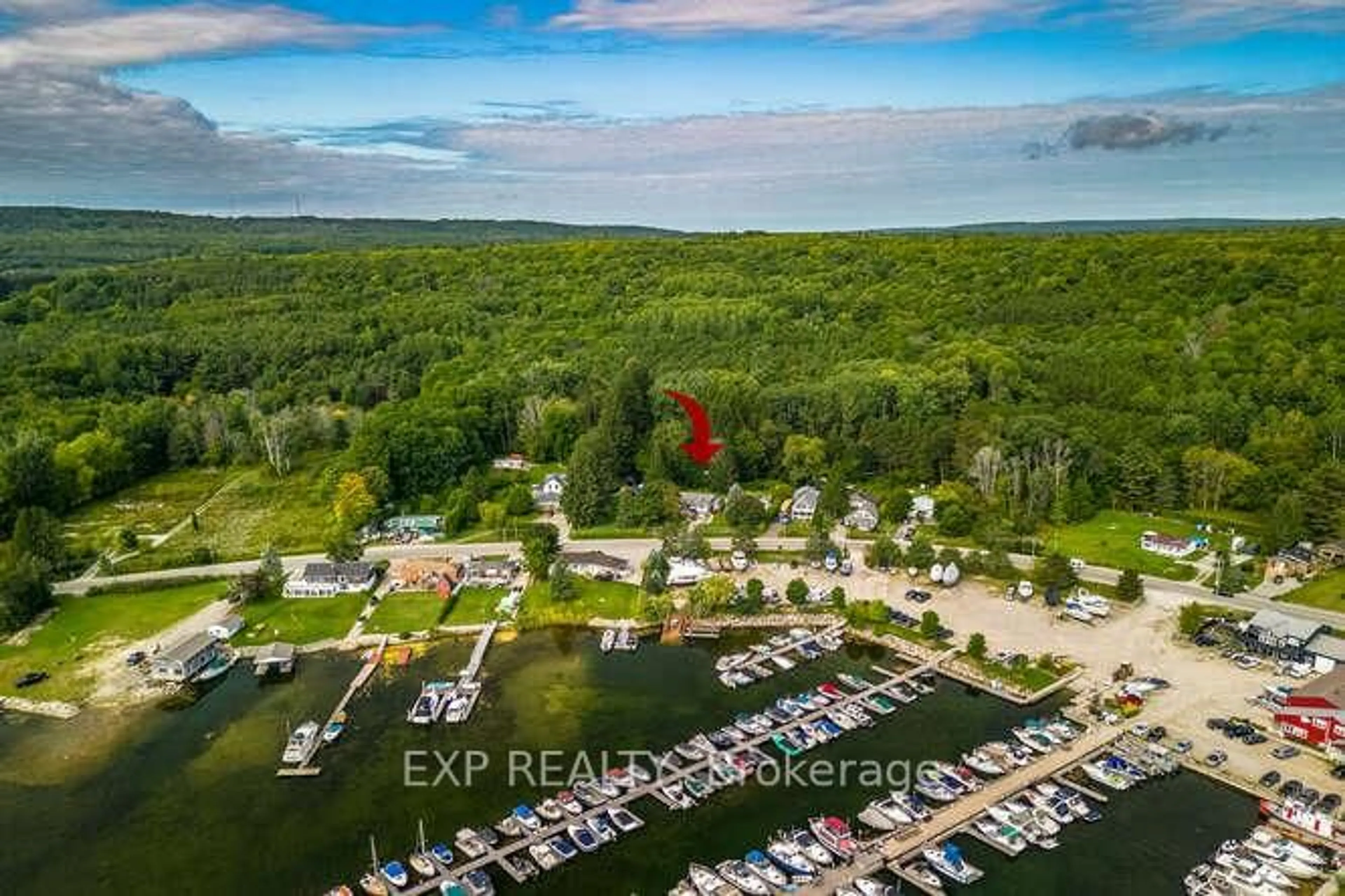A pic from outside/outdoor area/front of a property/back of a property/a pic from drone, water/lake/river/ocean view for 304 Champlain Rd, Penetanguishene Ontario L9M 1S4