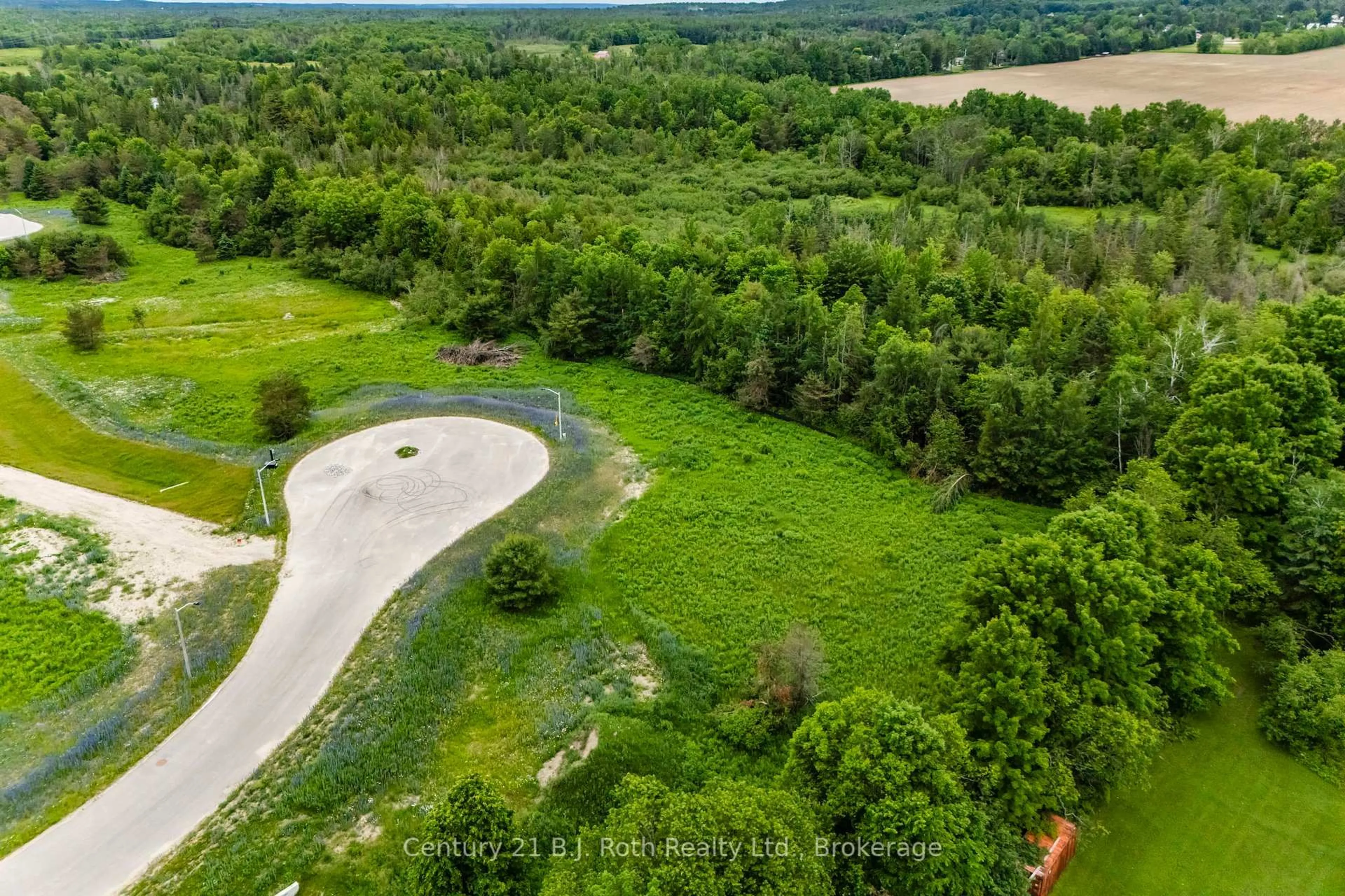 A pic from outside/outdoor area/front of a property/back of a property/a pic from drone, forest/trees view for 14 Greenlaw Crt, Springwater Ontario L0L 1V0