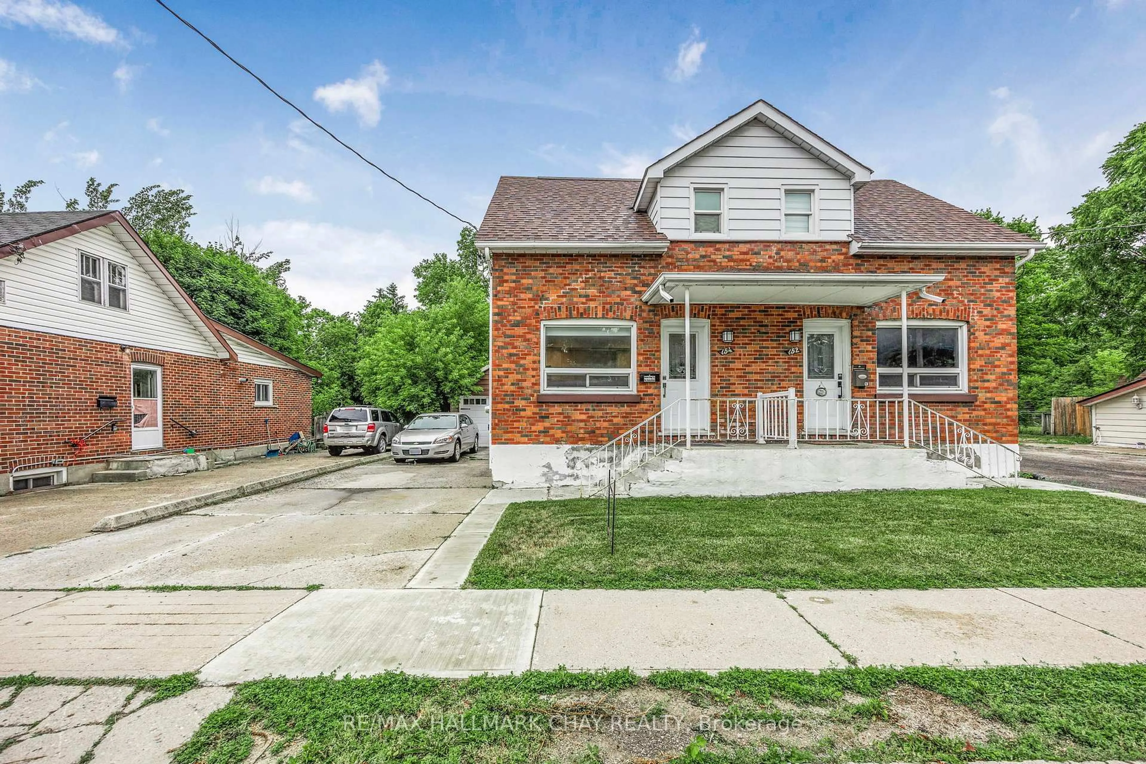 Home with brick exterior material, street for 154 Sanford St, Barrie Ontario L4N 3C7