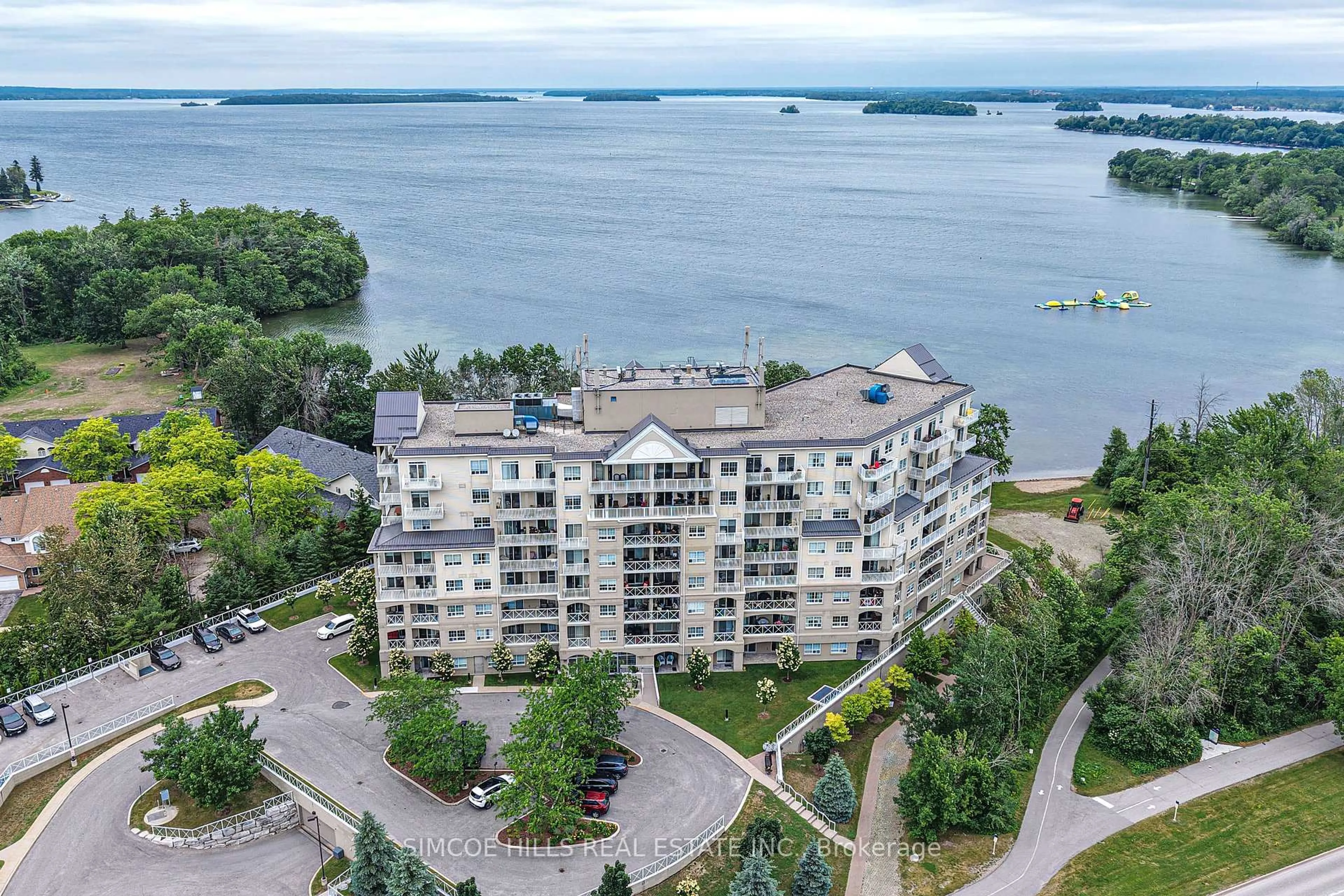A pic from outside/outdoor area/front of a property/back of a property/a pic from drone, water/lake/river/ocean view for 354 Atherley Rd #509, Orillia Ontario L3V 0B8