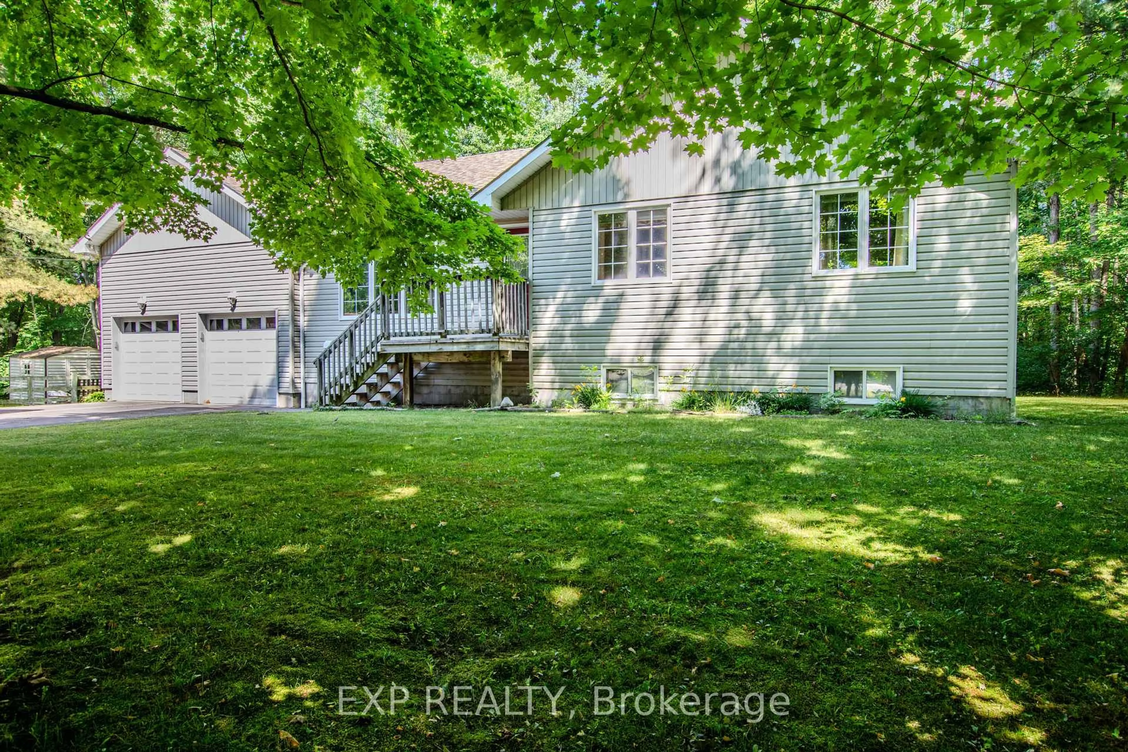 A pic from outside/outdoor area/front of a property/back of a property/a pic from drone, street for 56 Becketts Side Rd, Tay Ontario L0K 2C0