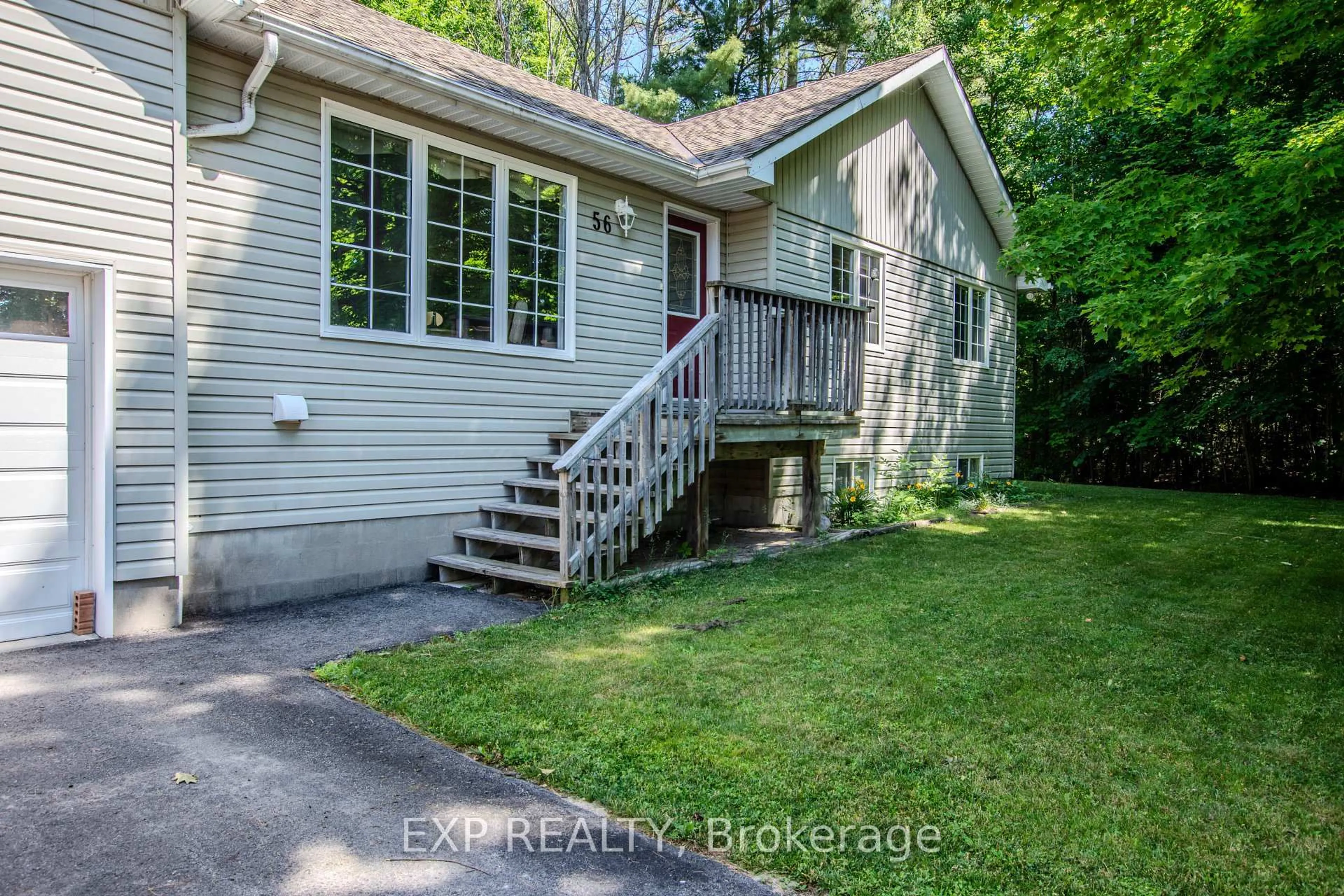 A pic from outside/outdoor area/front of a property/back of a property/a pic from drone, street for 56 Becketts Side Rd, Tay Ontario L0K 2C0
