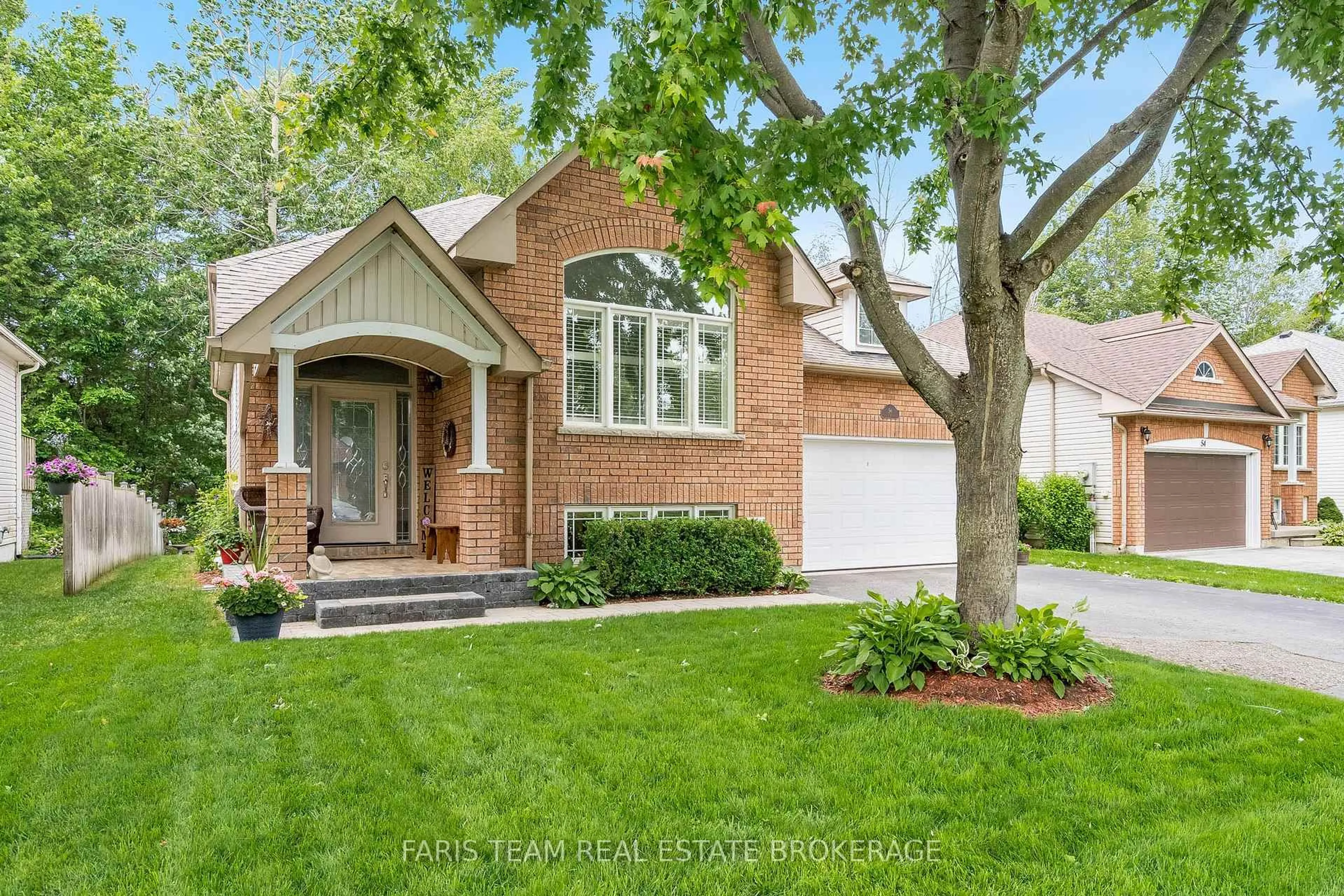 Home with brick exterior material, street for 56 Rose Valley Way, Wasaga Beach Ontario L9Z 3C4