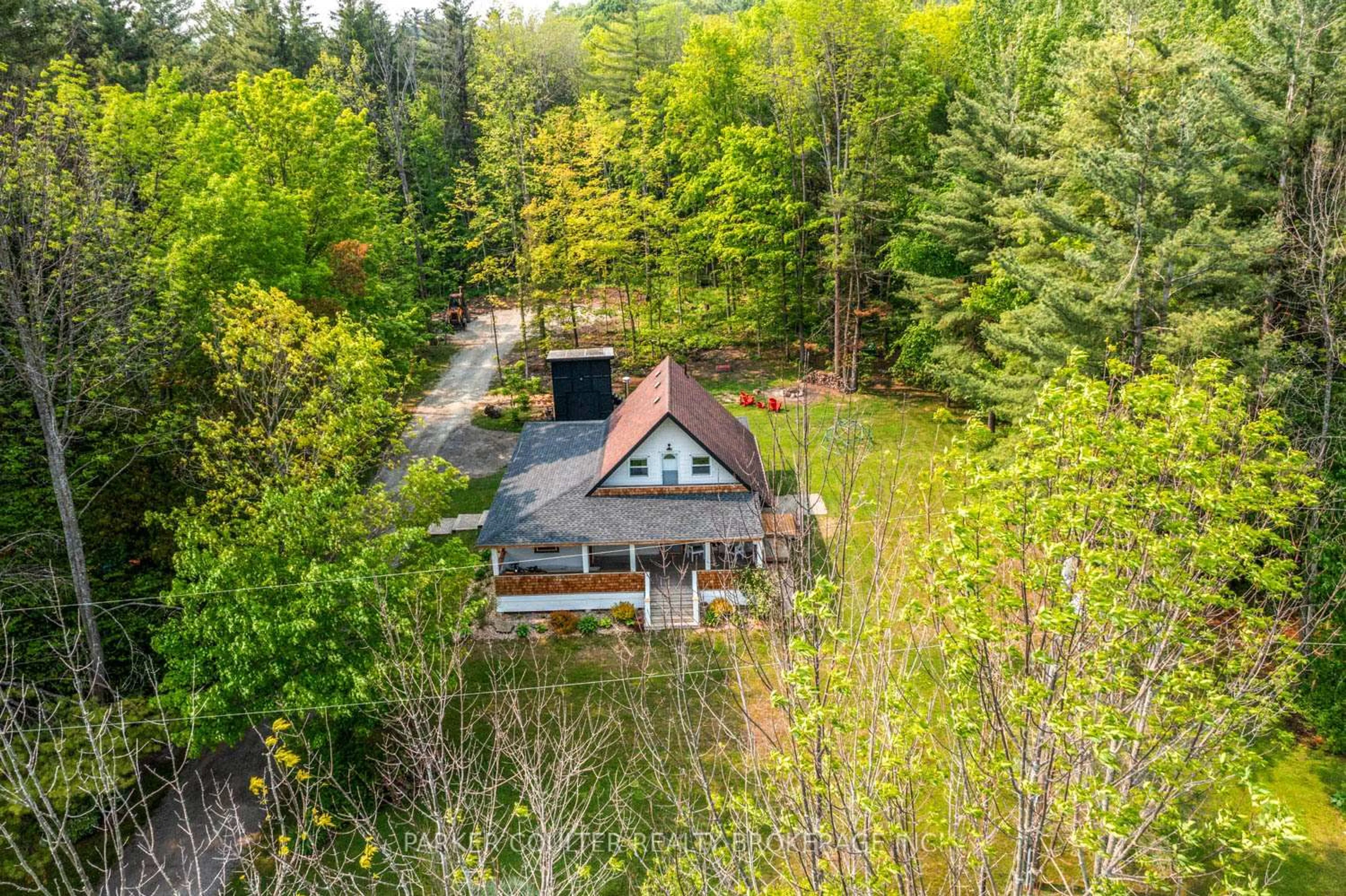 A pic from outside/outdoor area/front of a property/back of a property/a pic from drone, water/lake/river/ocean view for 2352 Mcdonald Rd, Springwater Ontario L0L 1P0