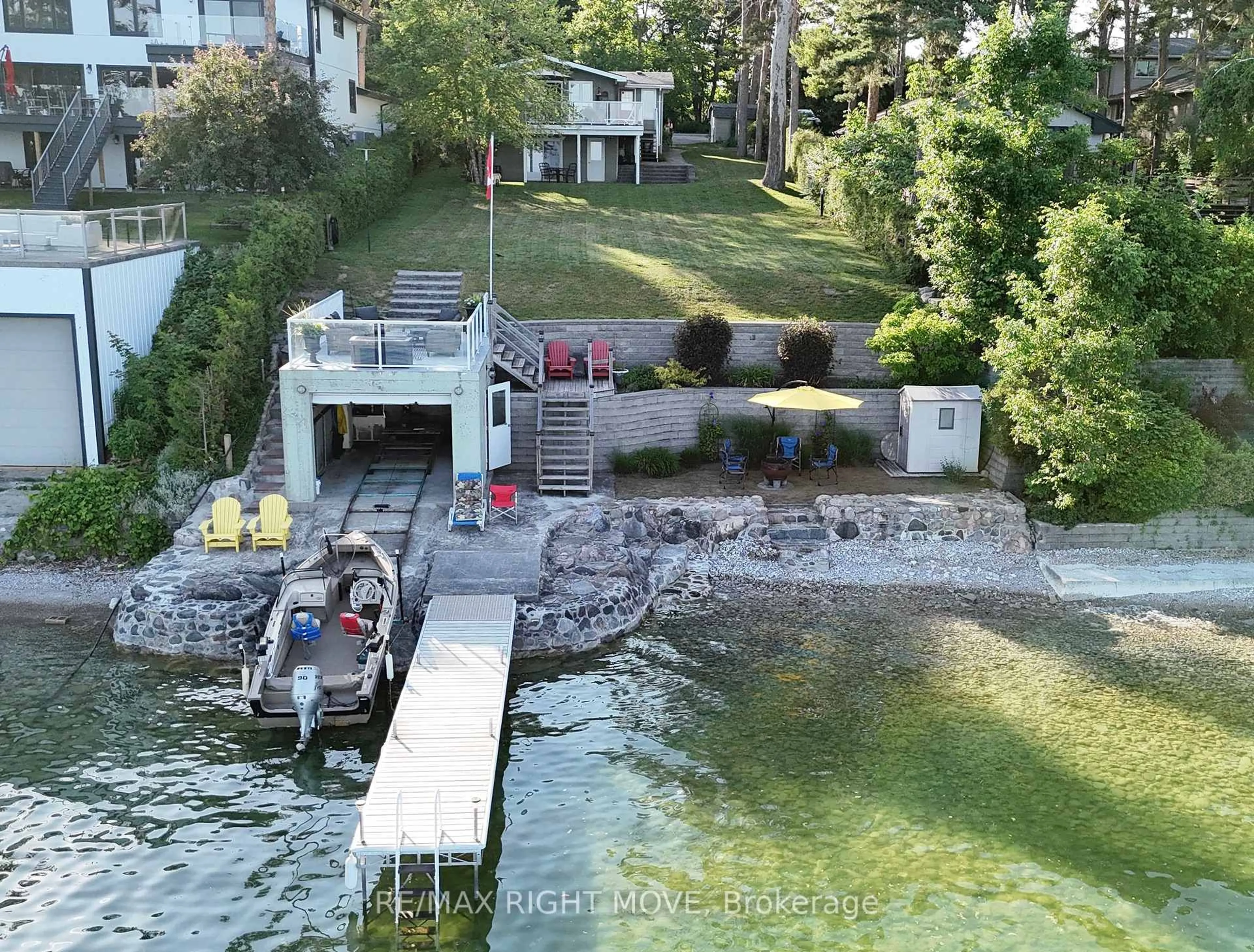 A pic from outside/outdoor area/front of a property/back of a property/a pic from drone, water/lake/river/ocean view for 1185 Woodland Dr, Oro-Medonte Ontario L3V 6H1