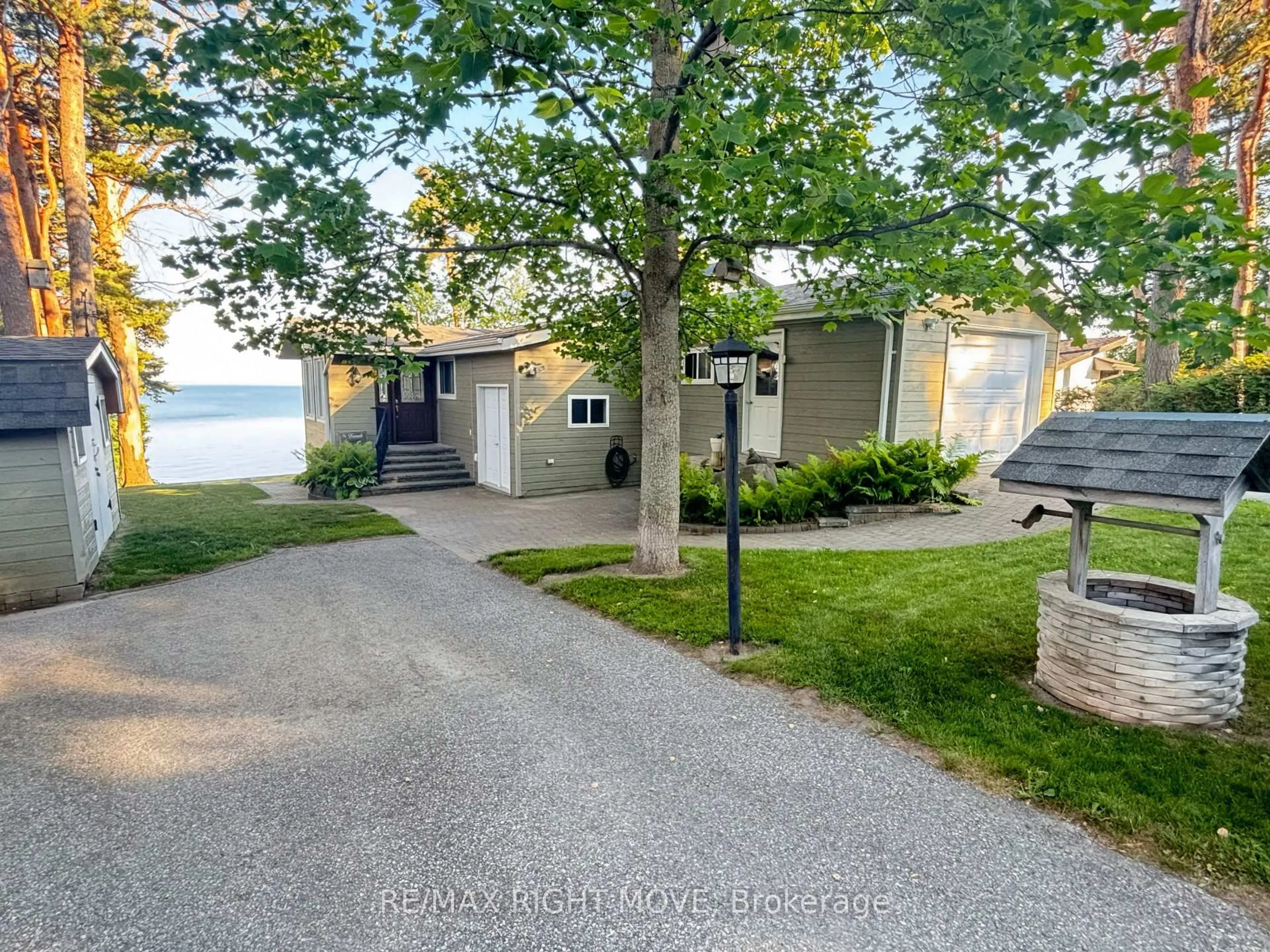 A pic from outside/outdoor area/front of a property/back of a property/a pic from drone, water/lake/river/ocean view for 1185 Woodland Dr, Oro-Medonte Ontario L3V 6H1
