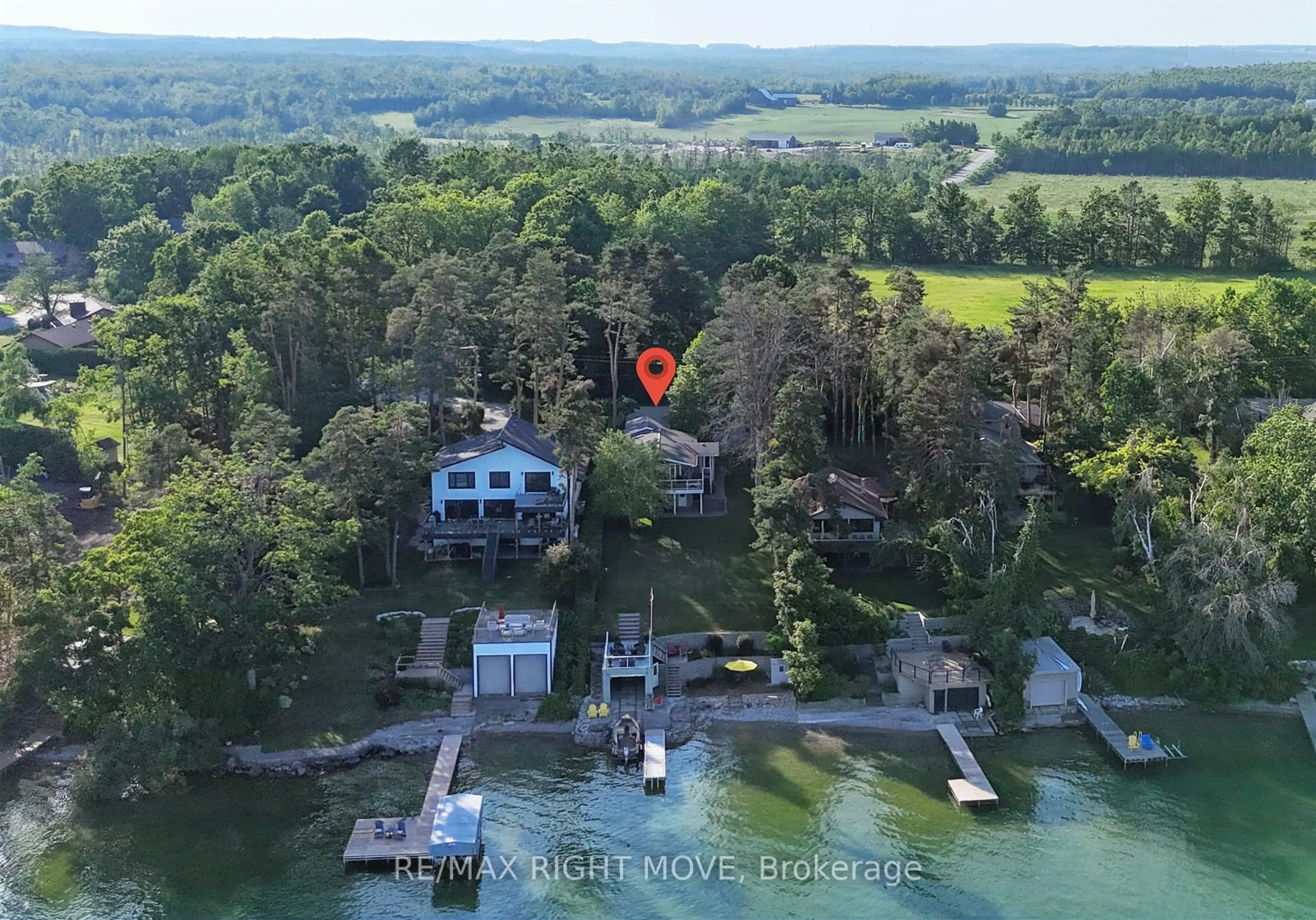 A pic from outside/outdoor area/front of a property/back of a property/a pic from drone, water/lake/river/ocean view for 1185 Woodland Dr, Oro-Medonte Ontario L3V 6H1