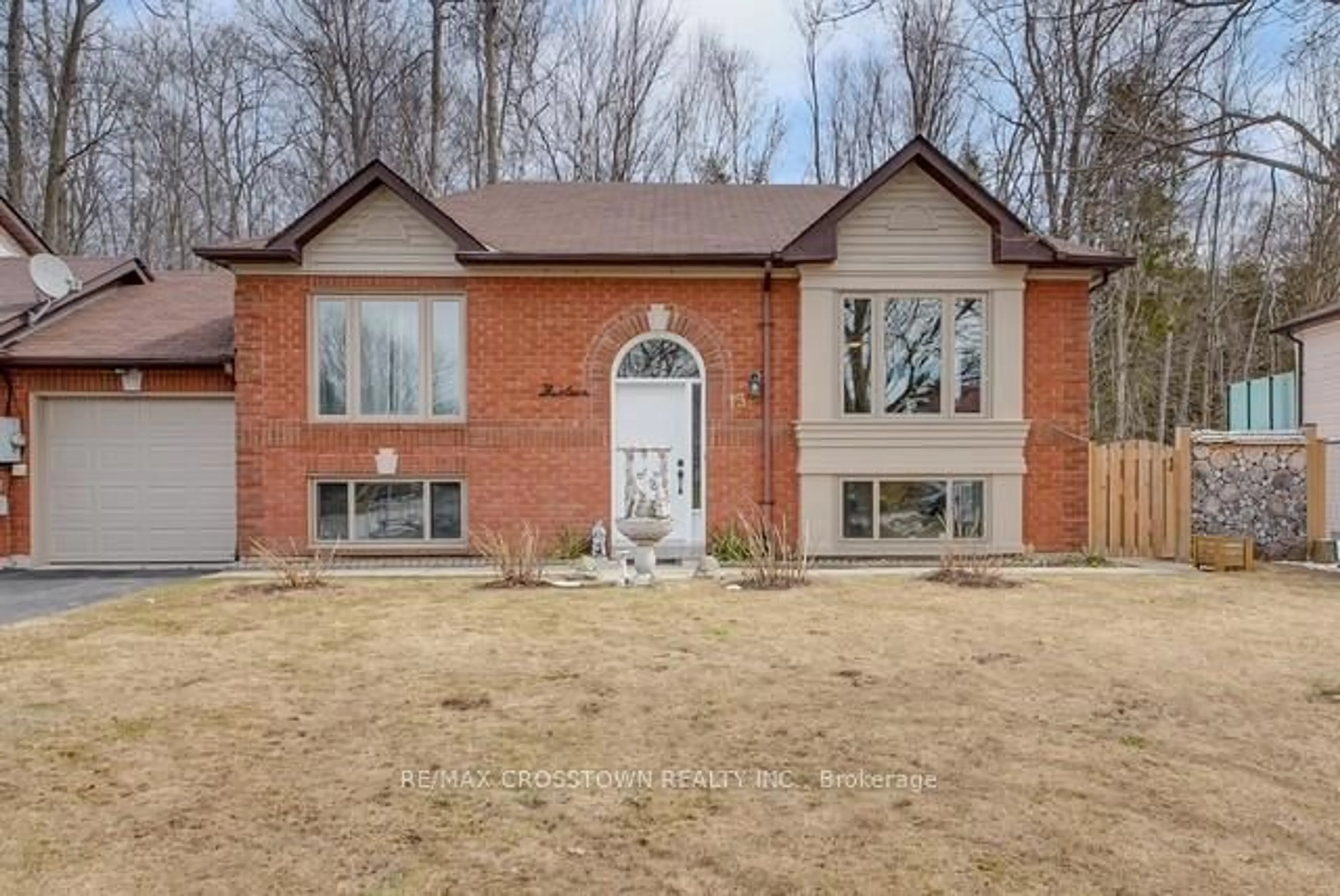Home with brick exterior material, street for 13 Harbour Cres, Wasaga Beach Ontario L9Z 1G4